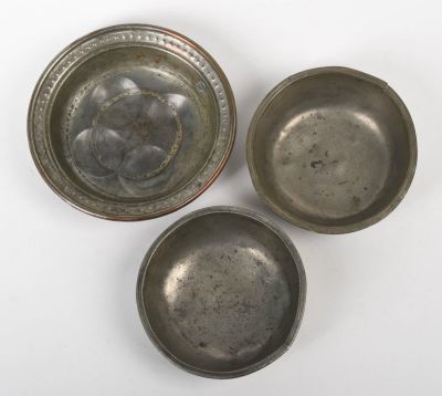 Two Pewter Bowls and a Food Mold. Diameter of bowls 5.75 inches, late 18th century. Diameter of 