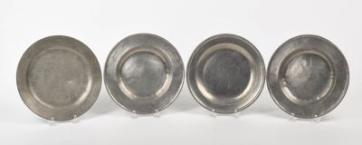 Four English Pewter Plates. Late 18th and early 19th century, diameters 7.875 and 8.375 inches.