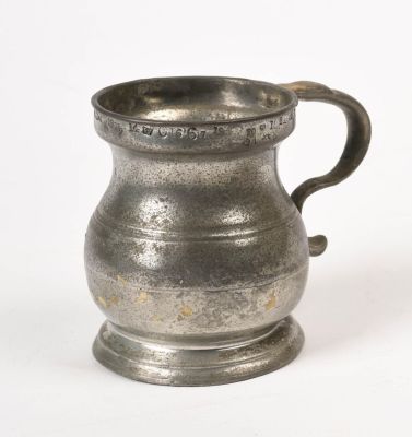 19th C. English Pewter Measure. Height 3.75 inches, rim imprinted with various marks.