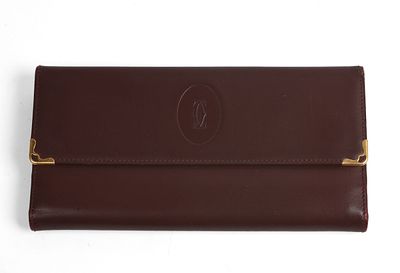 Cartier Red Leather Bi-Fold Wallet. 4 x 7.5 inches, very good condition. Guaranteed authentic.