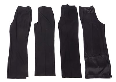 Four Pairs of Escada Pants. Sizes 40 and 38. A few small stains. From the collection of Jane Morgan.