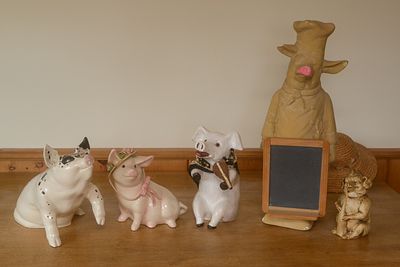 Five Decorative Pigs. Tallest 24 inches.