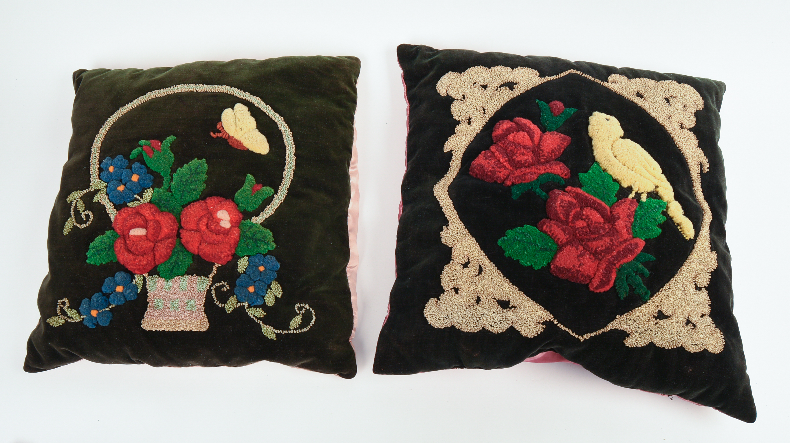 TWO 19TH CENTURY STUMPWORK PILLOWS.