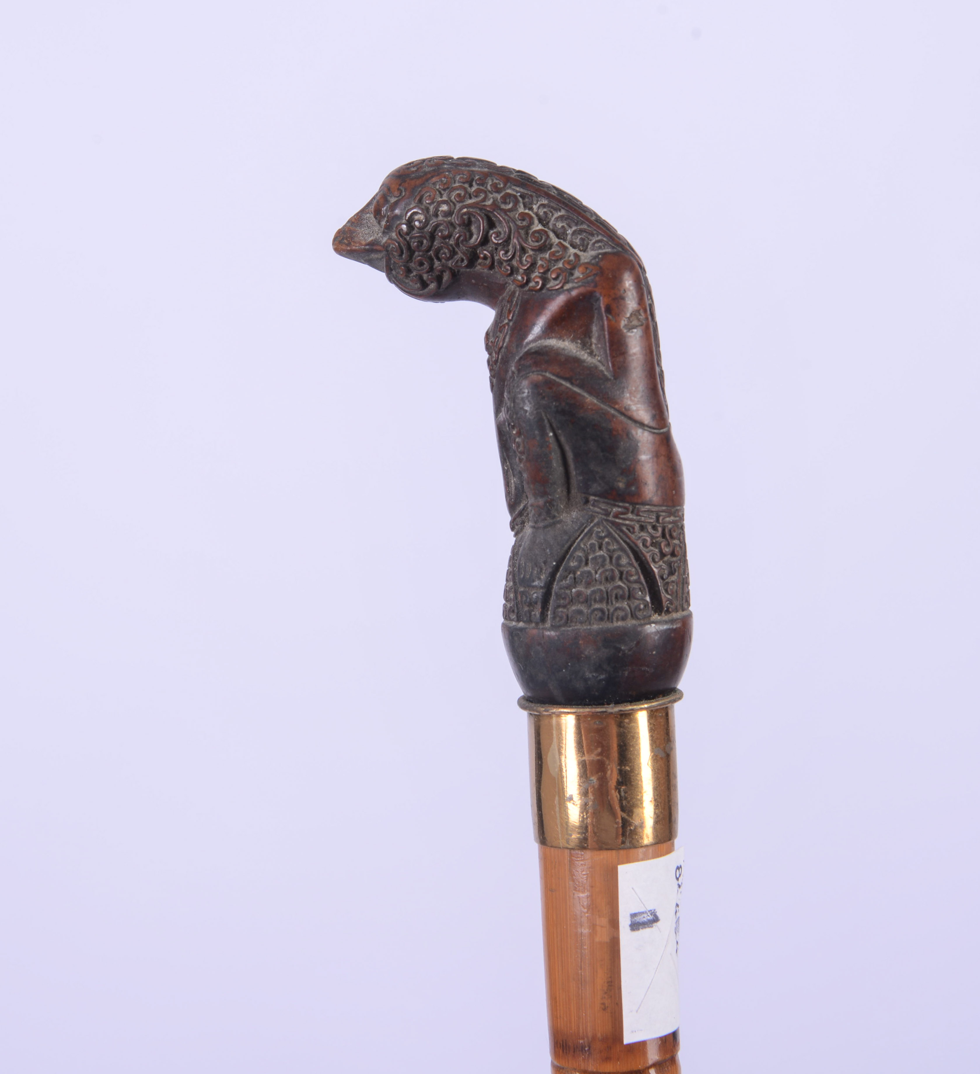CANE WITH SLOTH HANDLE.