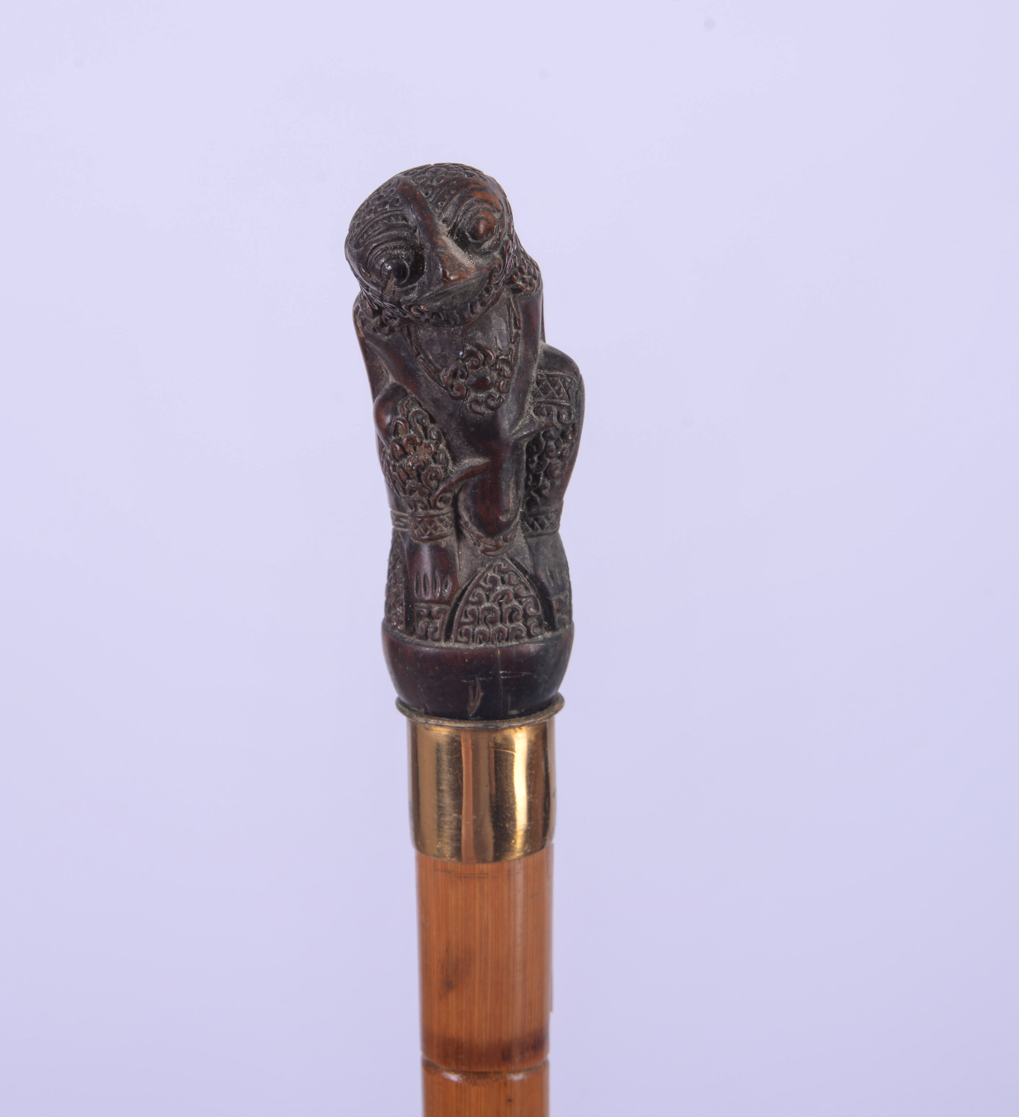 CANE WITH SLOTH HANDLE.