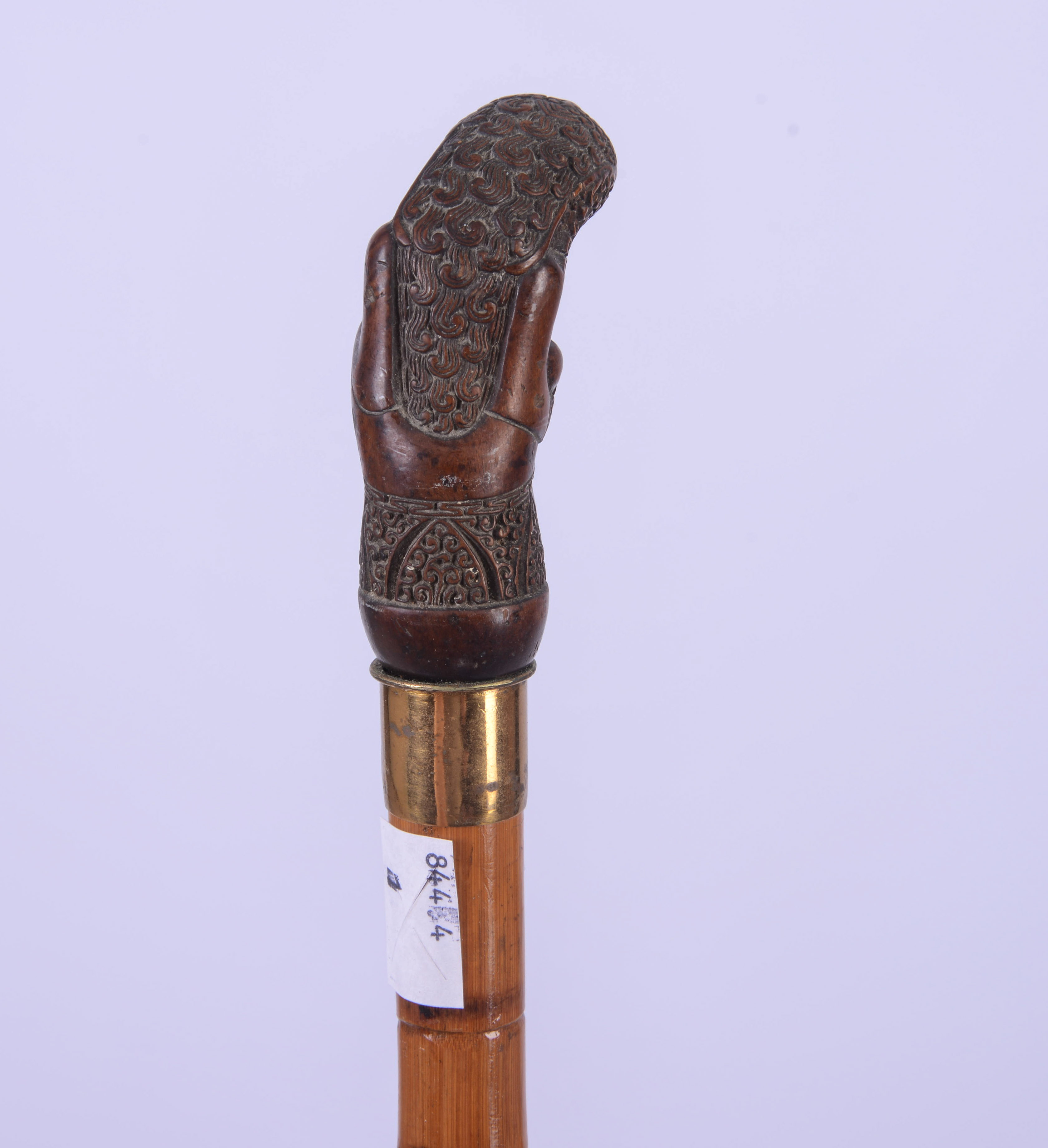 CANE WITH SLOTH HANDLE.