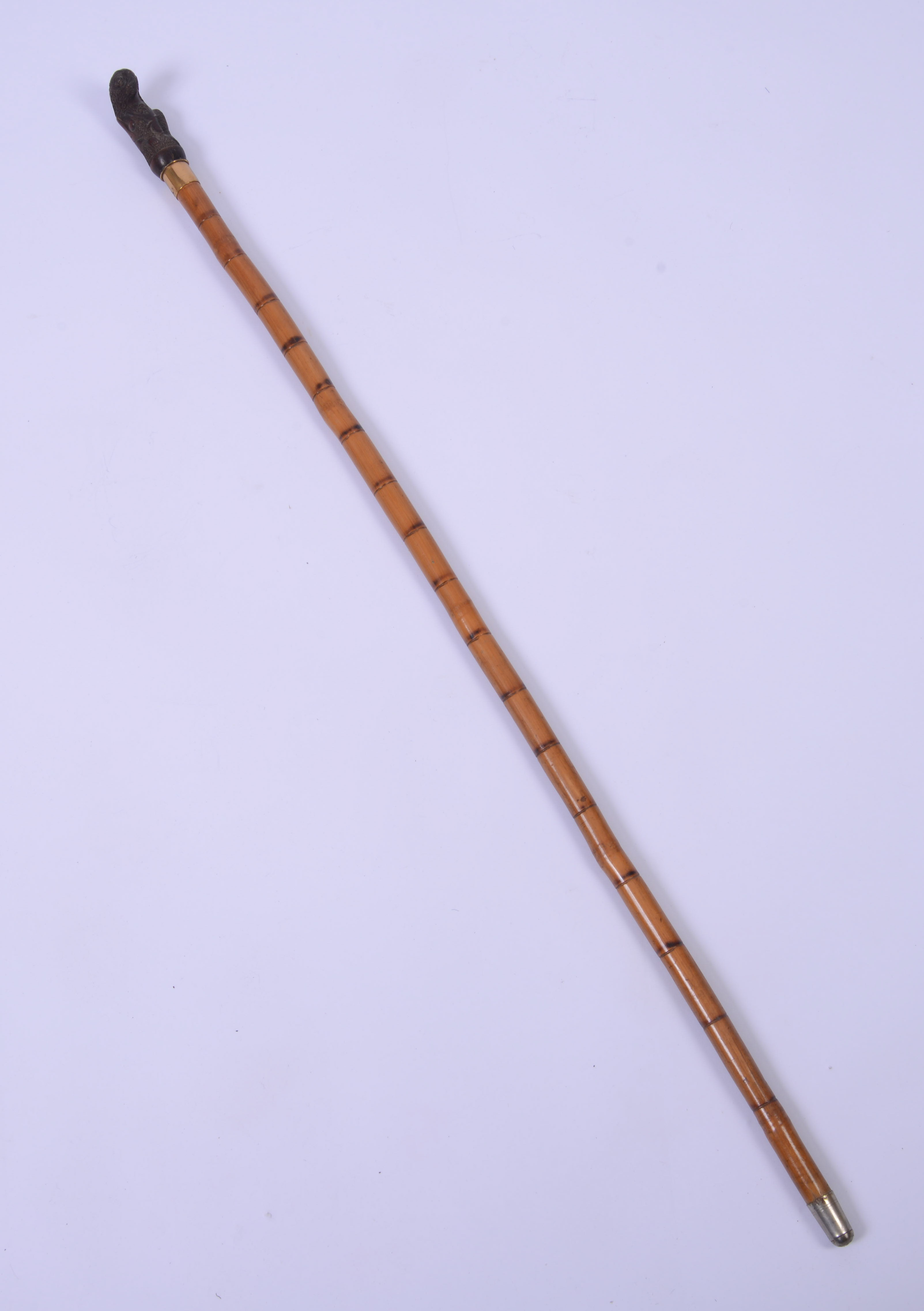 CANE WITH SLOTH HANDLE.