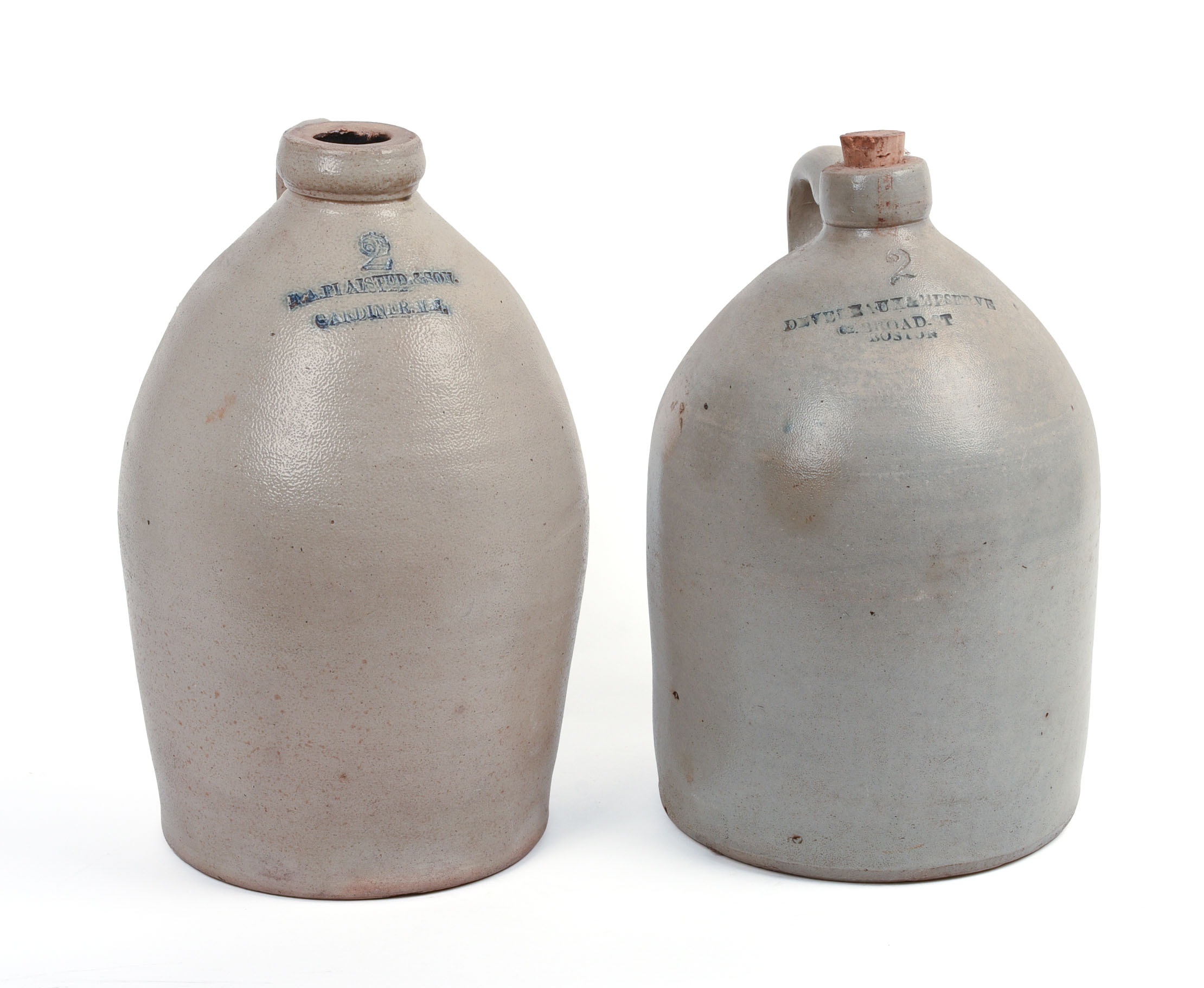 TWO TWO-GALLON STONEWARE JUGS.