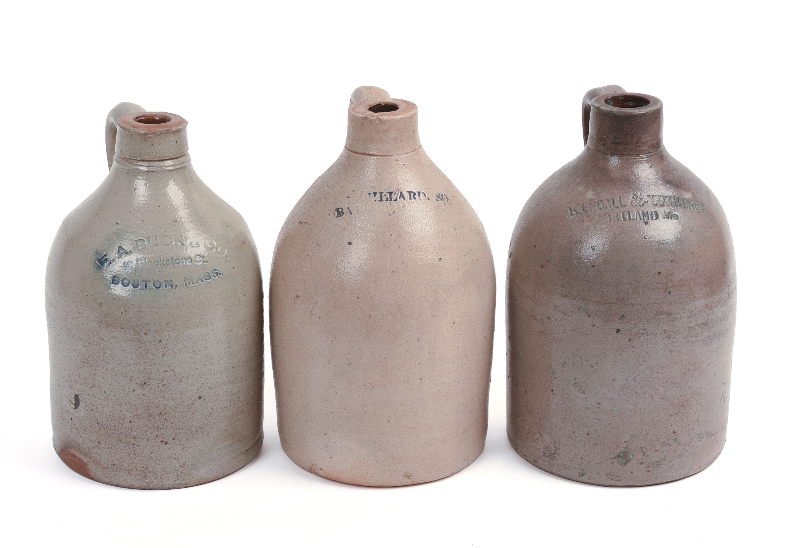 THREE SMALL STONEWARE JUGS.