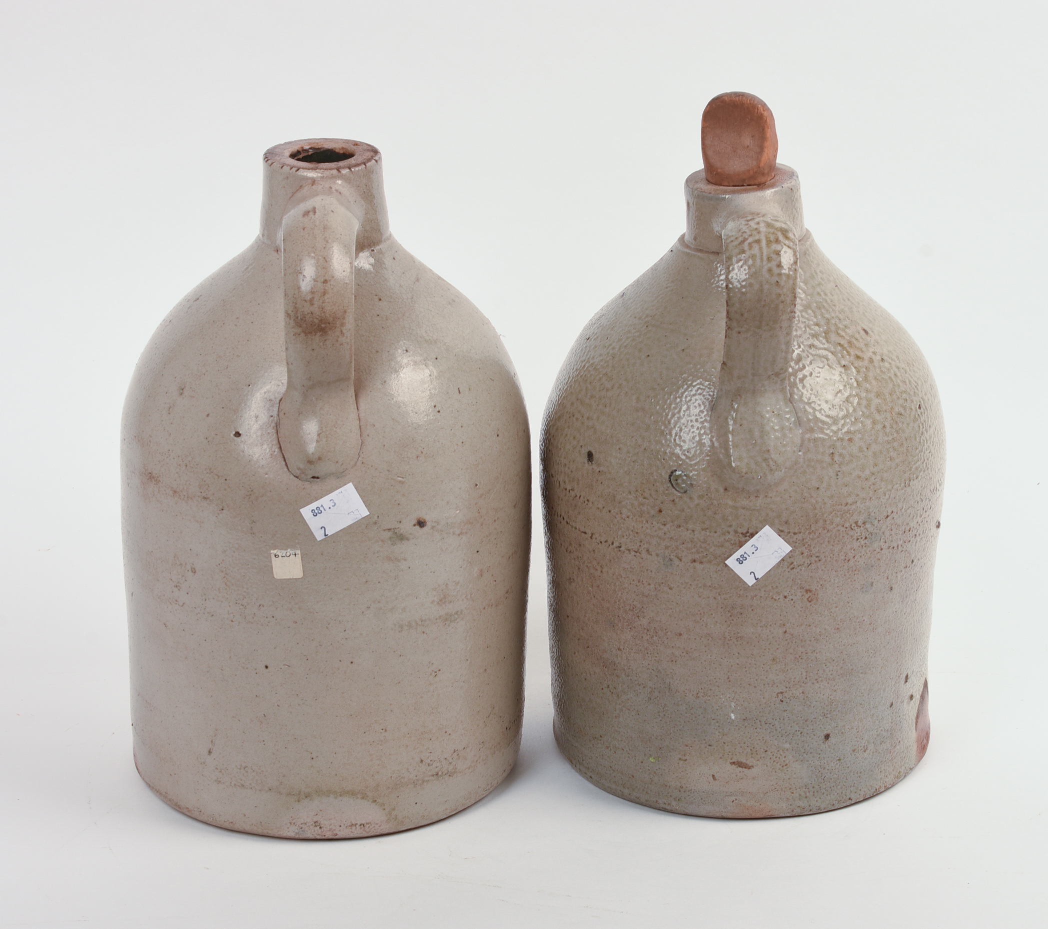 TWO STONEWARE CROCKS.