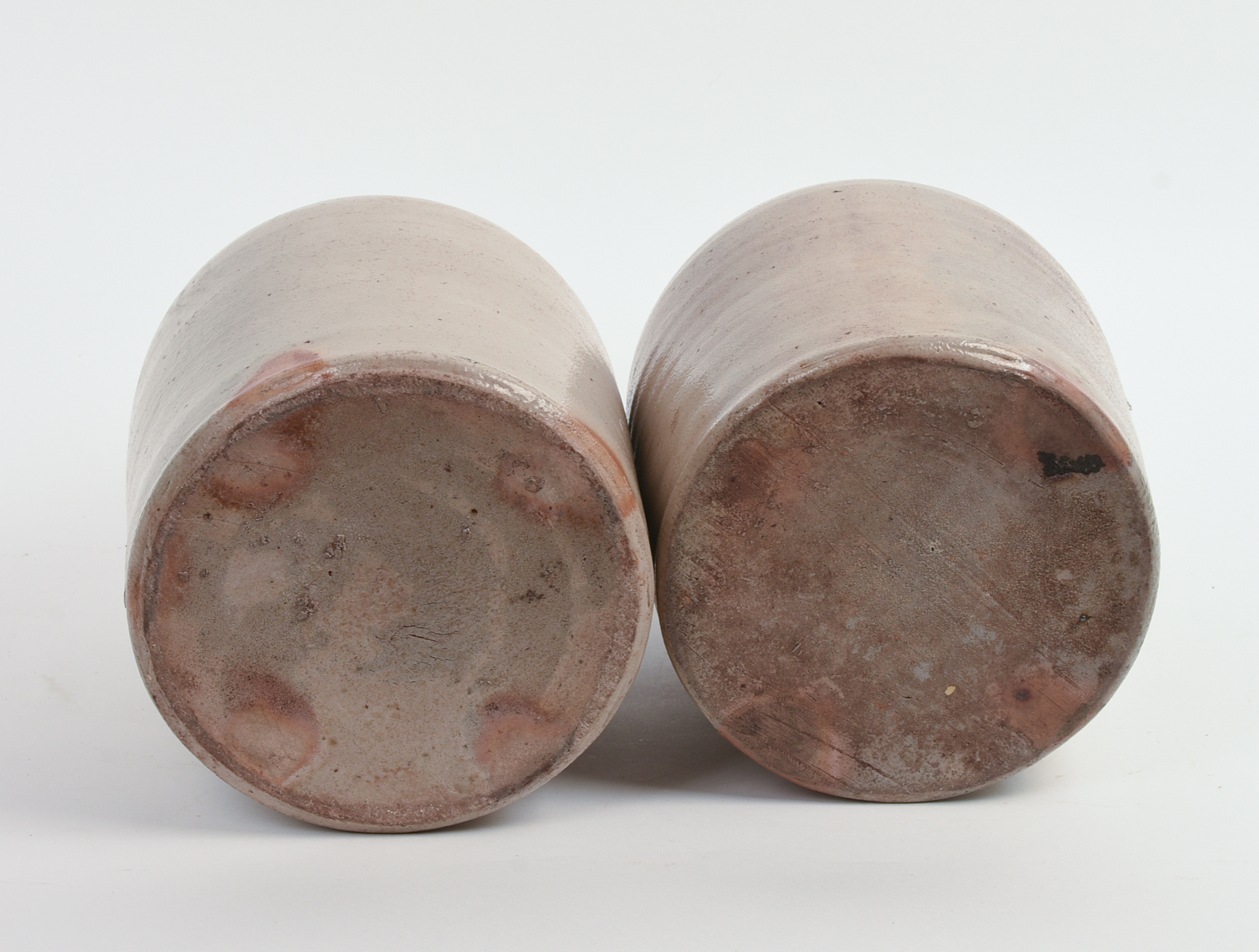 TWO STONEWARE CROCKS.