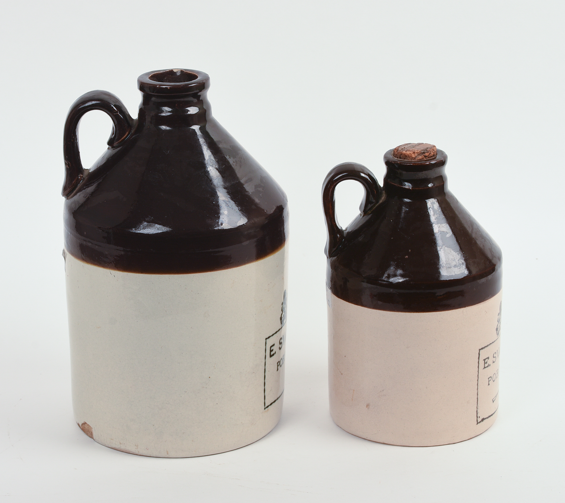TWO E. SWASEY & CO. STONEWARE CROCKS.