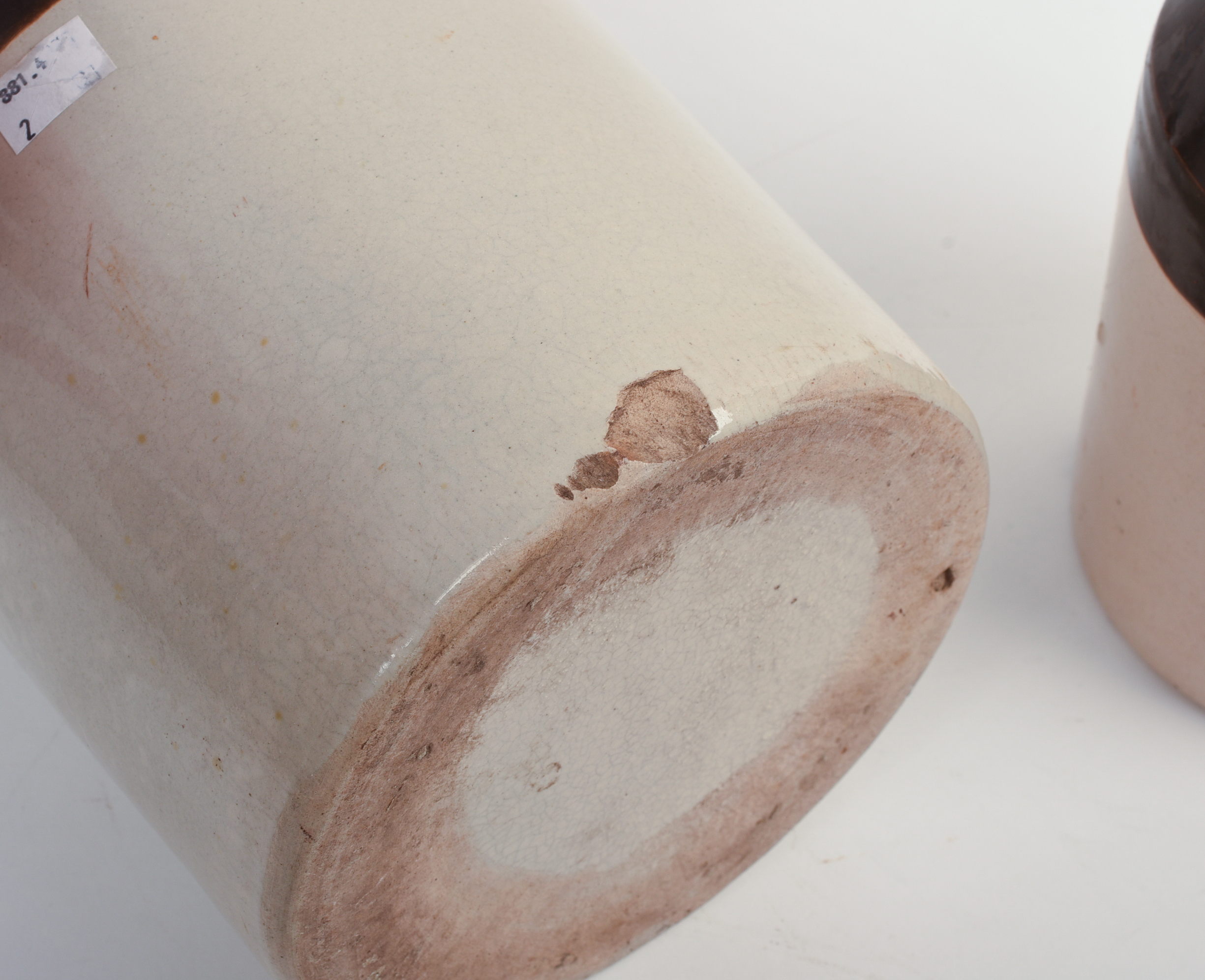 TWO E. SWASEY & CO. STONEWARE CROCKS.
