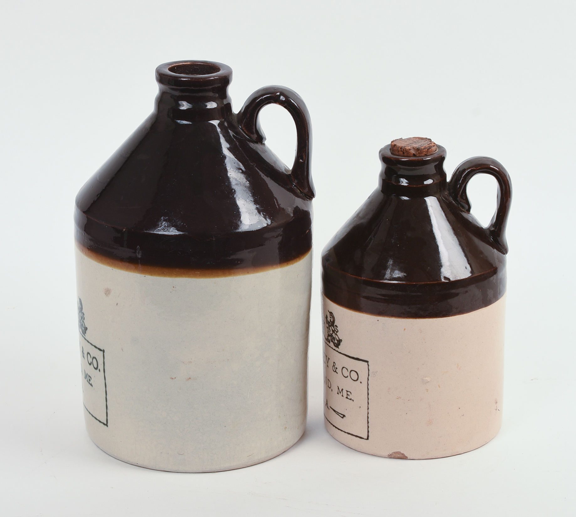 TWO E. SWASEY & CO. STONEWARE CROCKS.