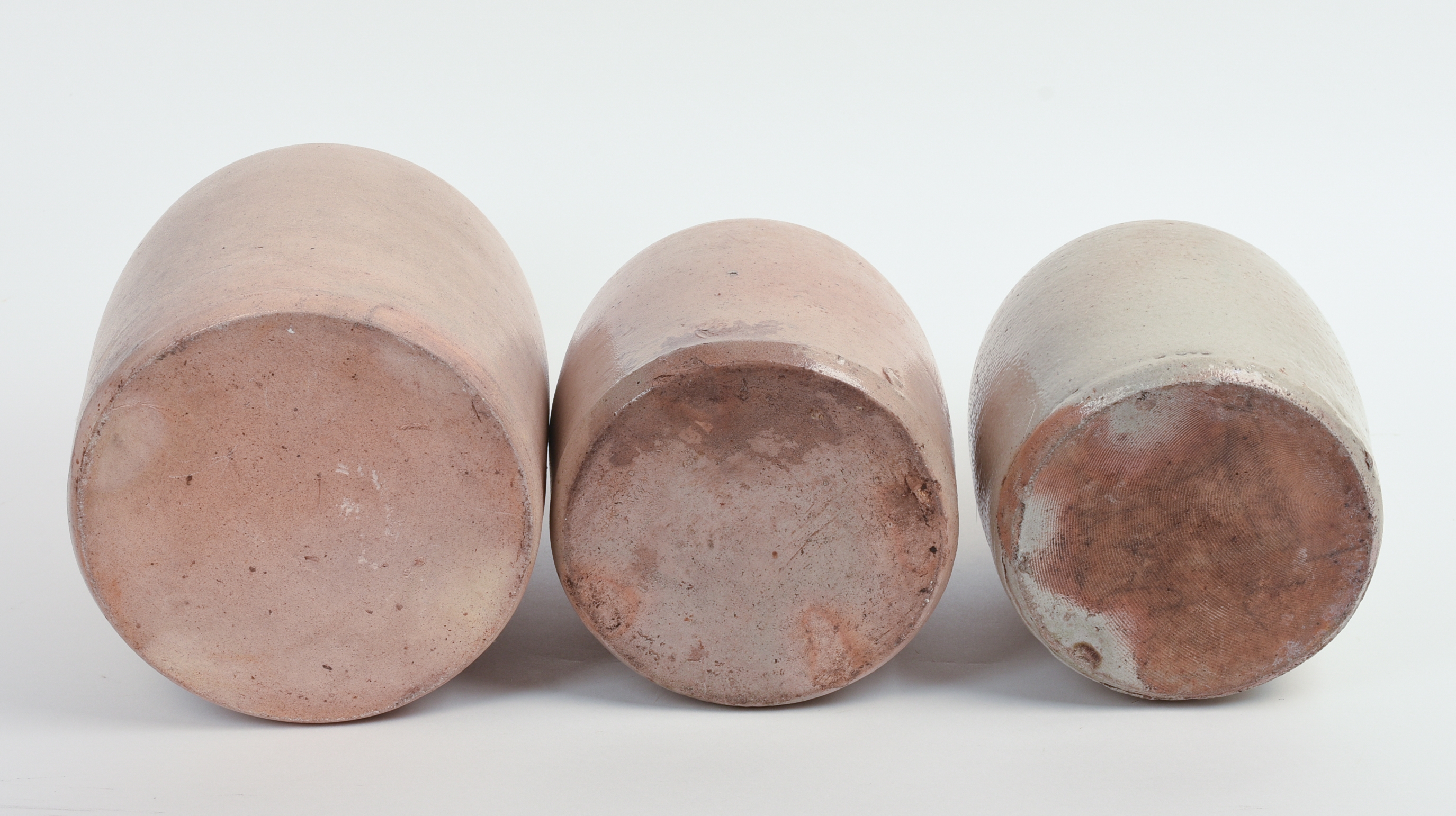 THREE STONEWARE JUGS.