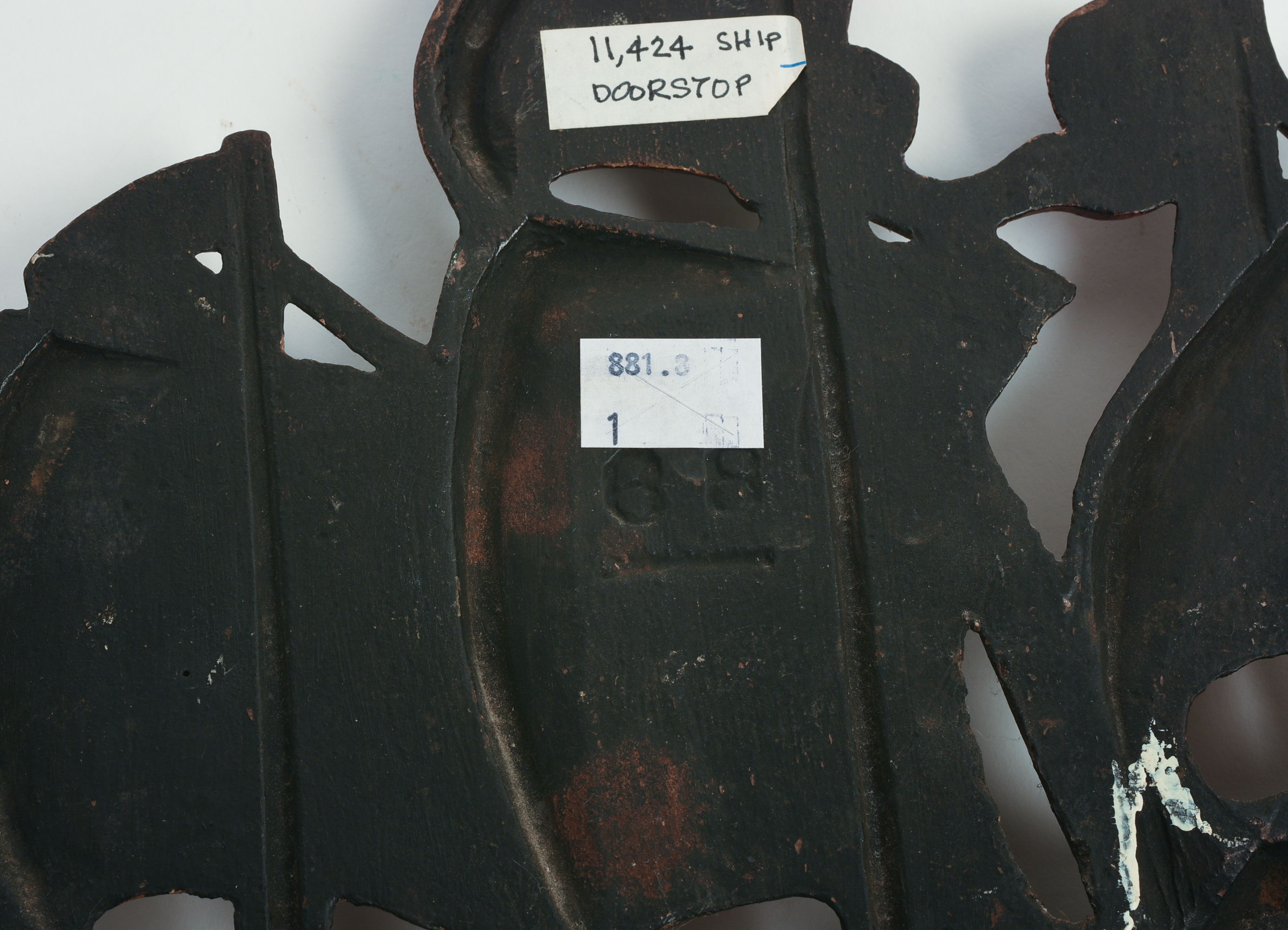 CAST IRON SHIP DOORSTOP.