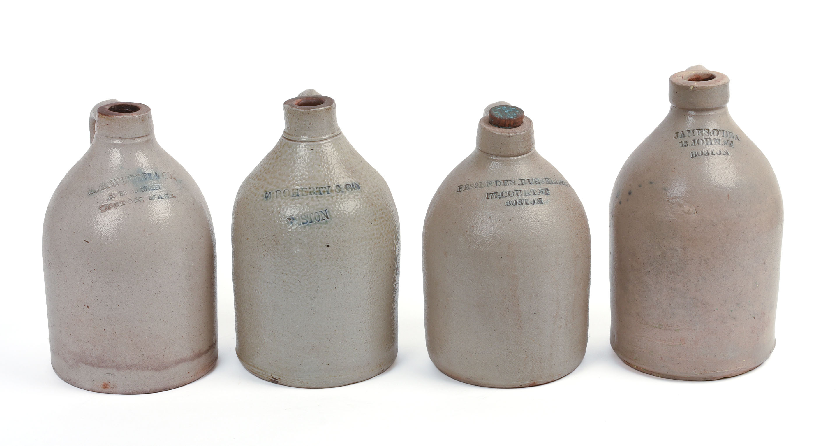 FOUR SMALL BOSTON STONEWARE JUGS.