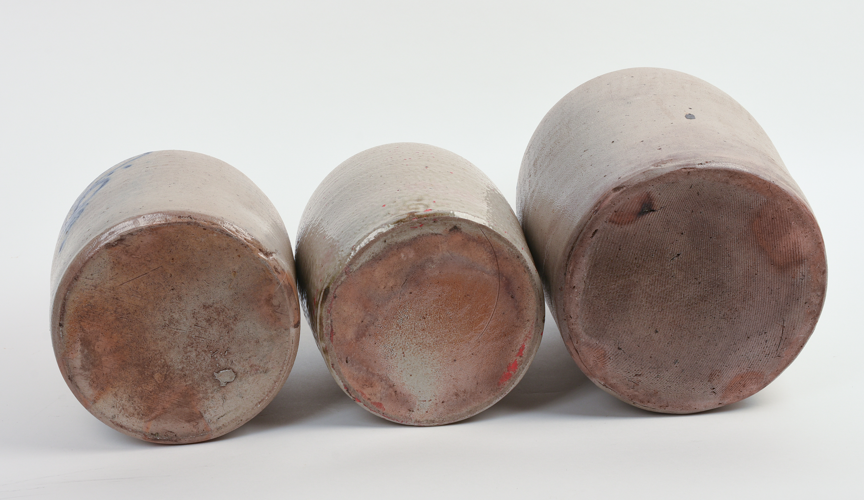 THREE STONEWARE JUGS.