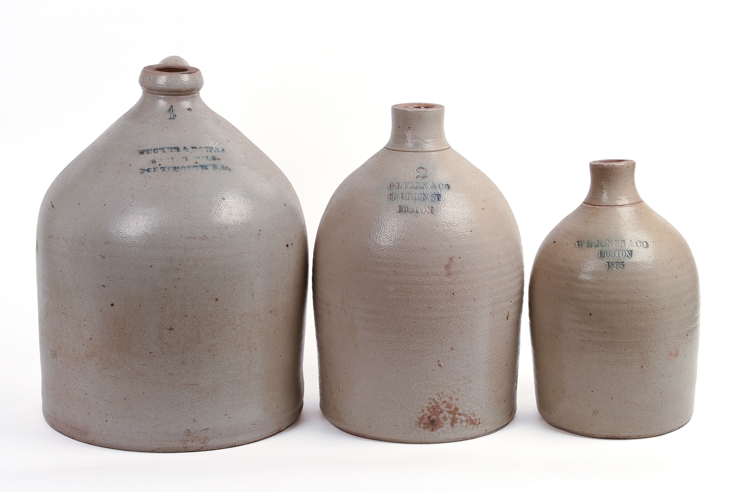 THREE STONEWARE JUGS.