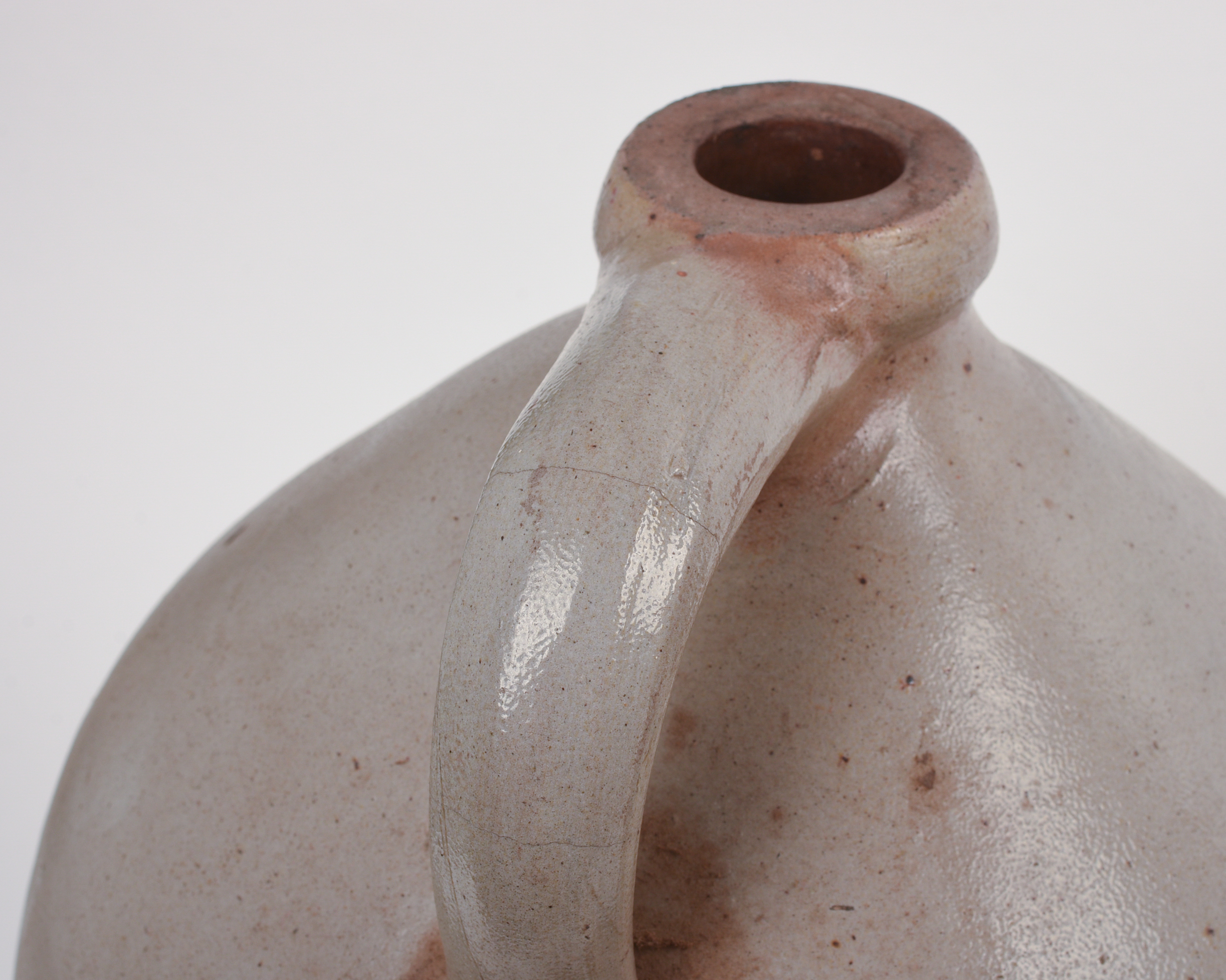 THREE STONEWARE JUGS.