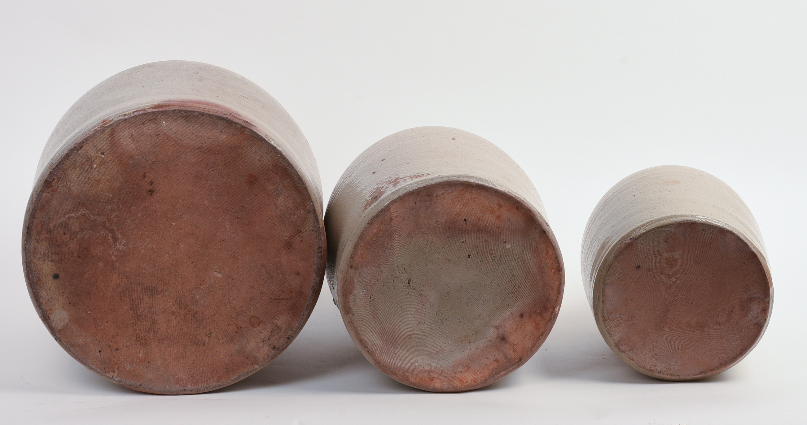 THREE STONEWARE JUGS.