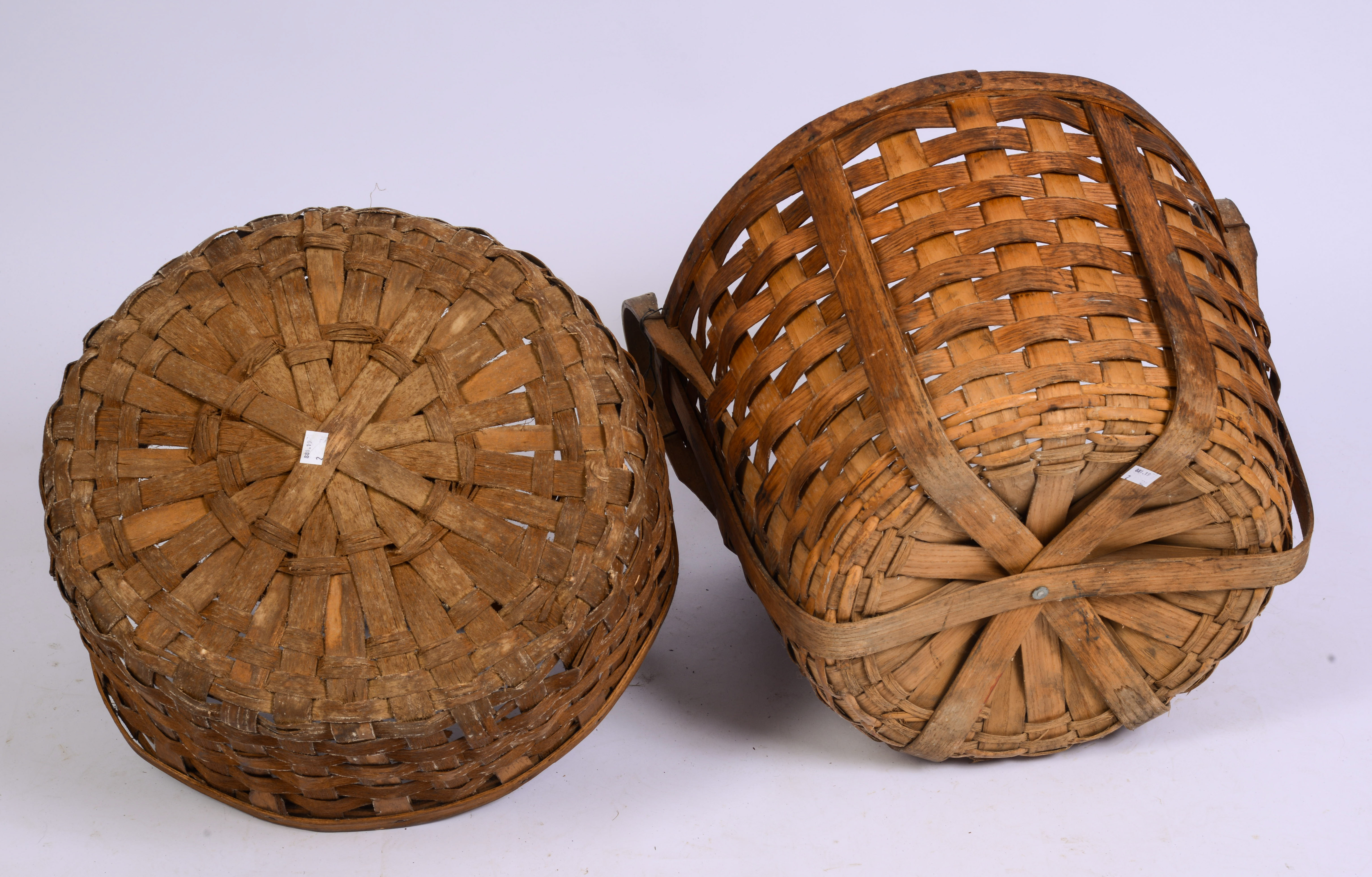 TWO LARGE ANTIQUE BASKETS.