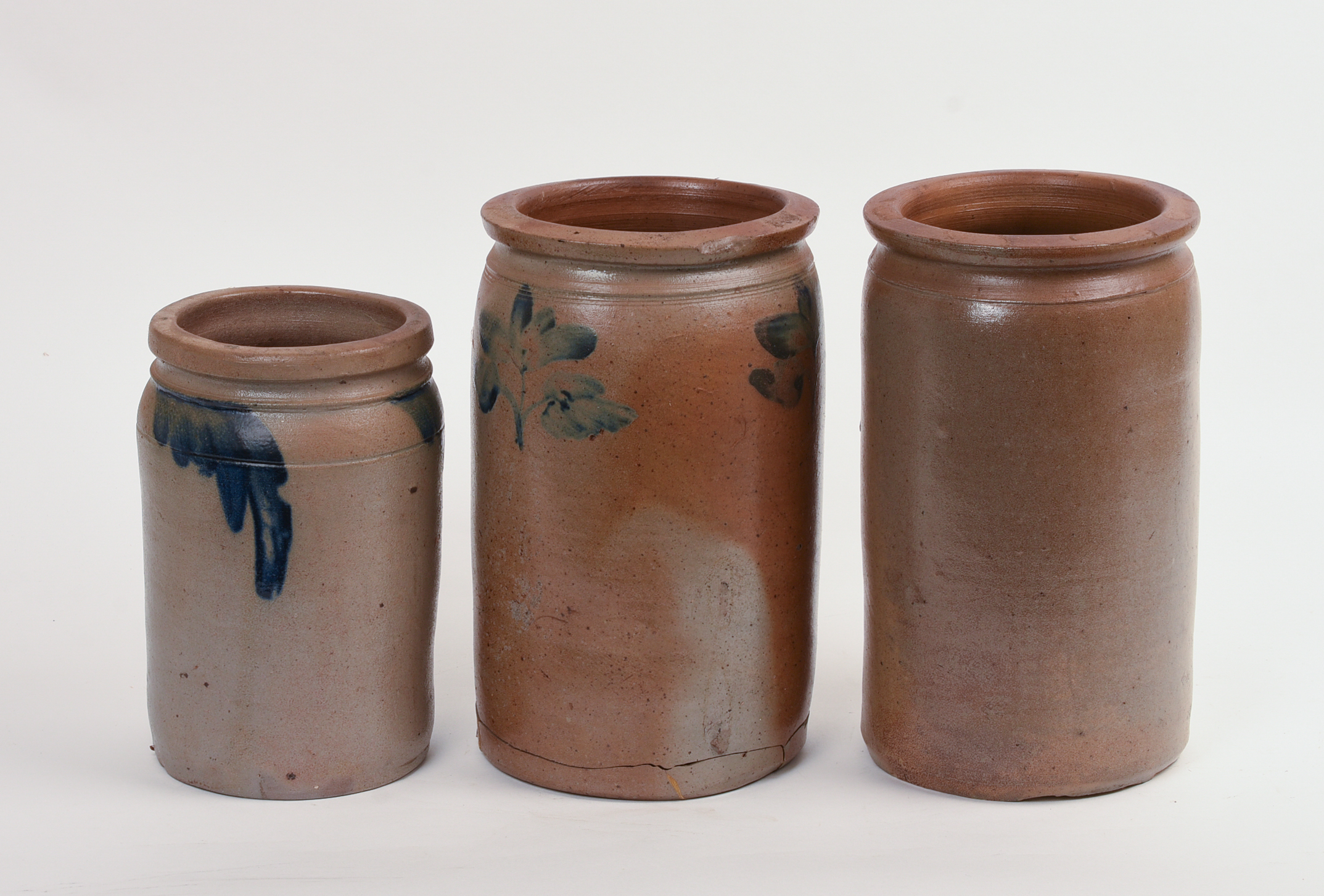 THREE STONEWARE CROCKS.