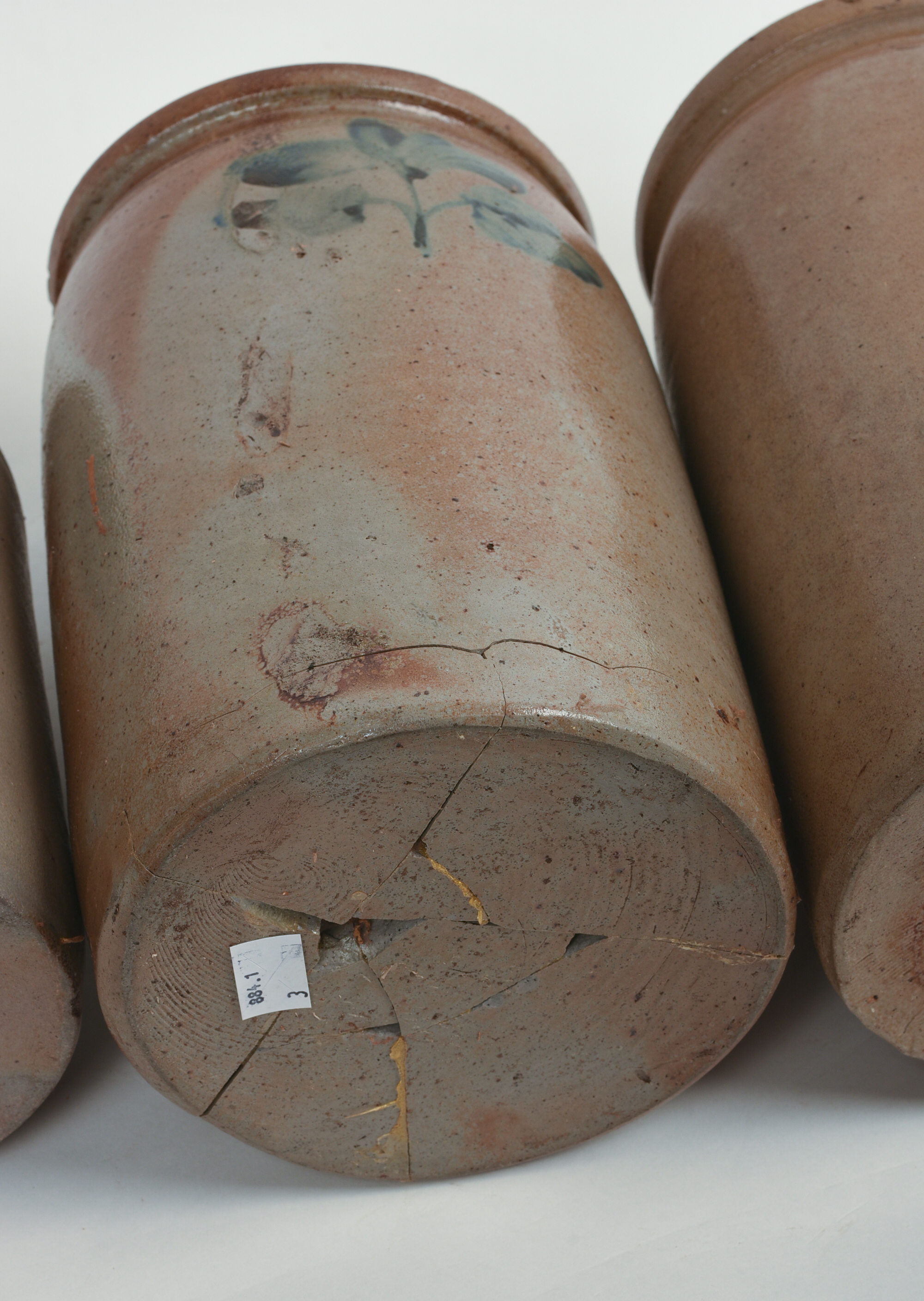 THREE STONEWARE CROCKS.