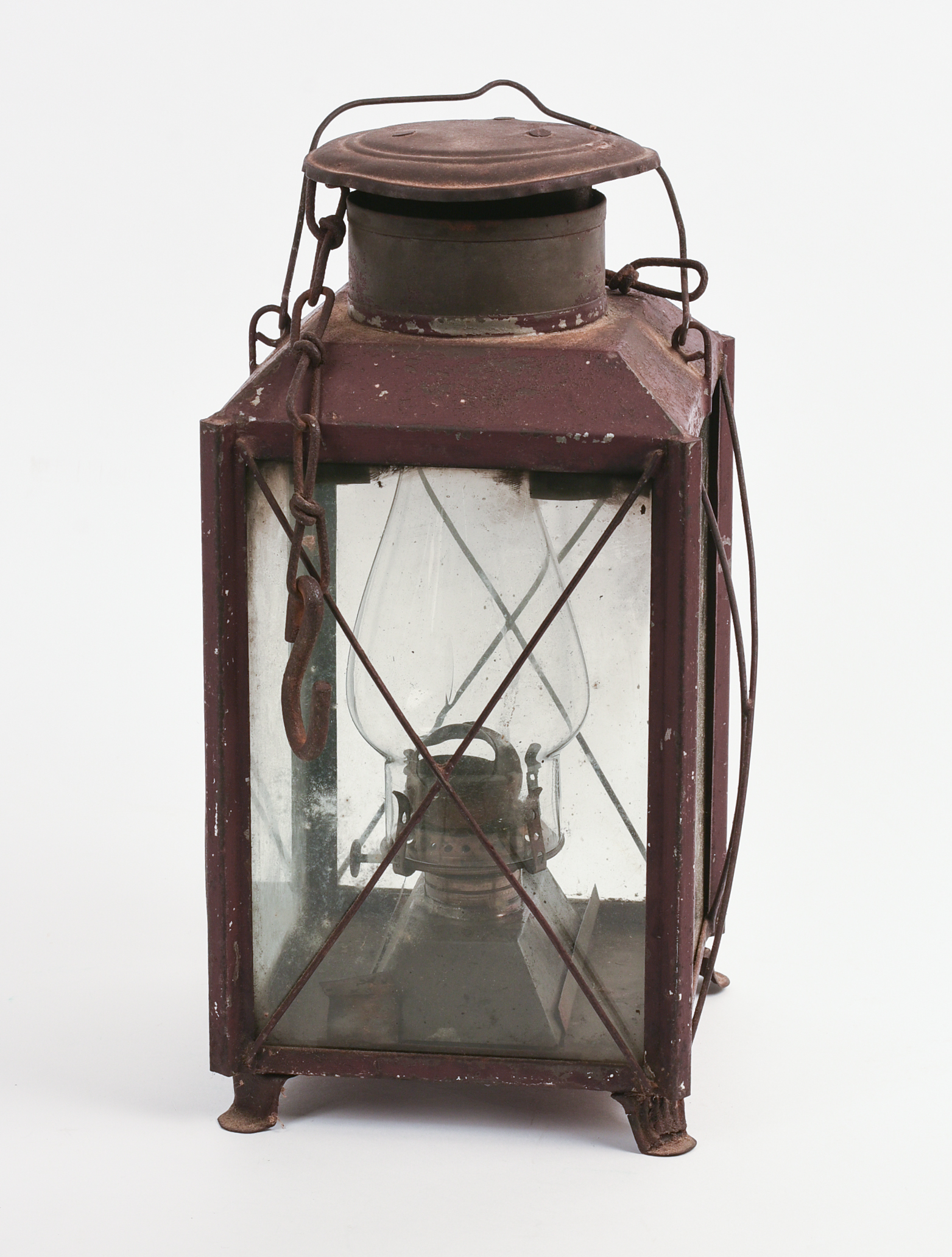 TIN LANTERN IN RED PAINT.