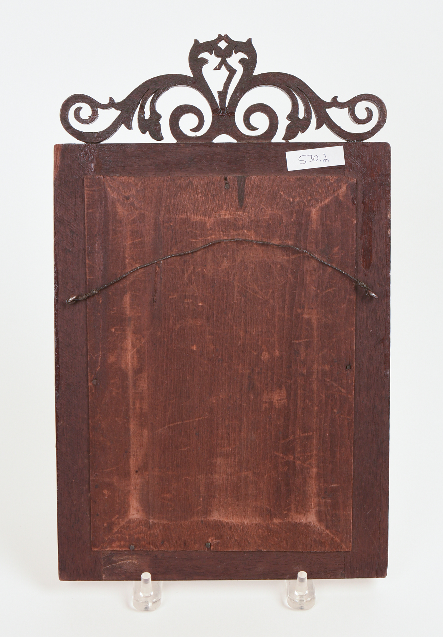 SMALL MIRROR WITH CARVED FRETWORK.