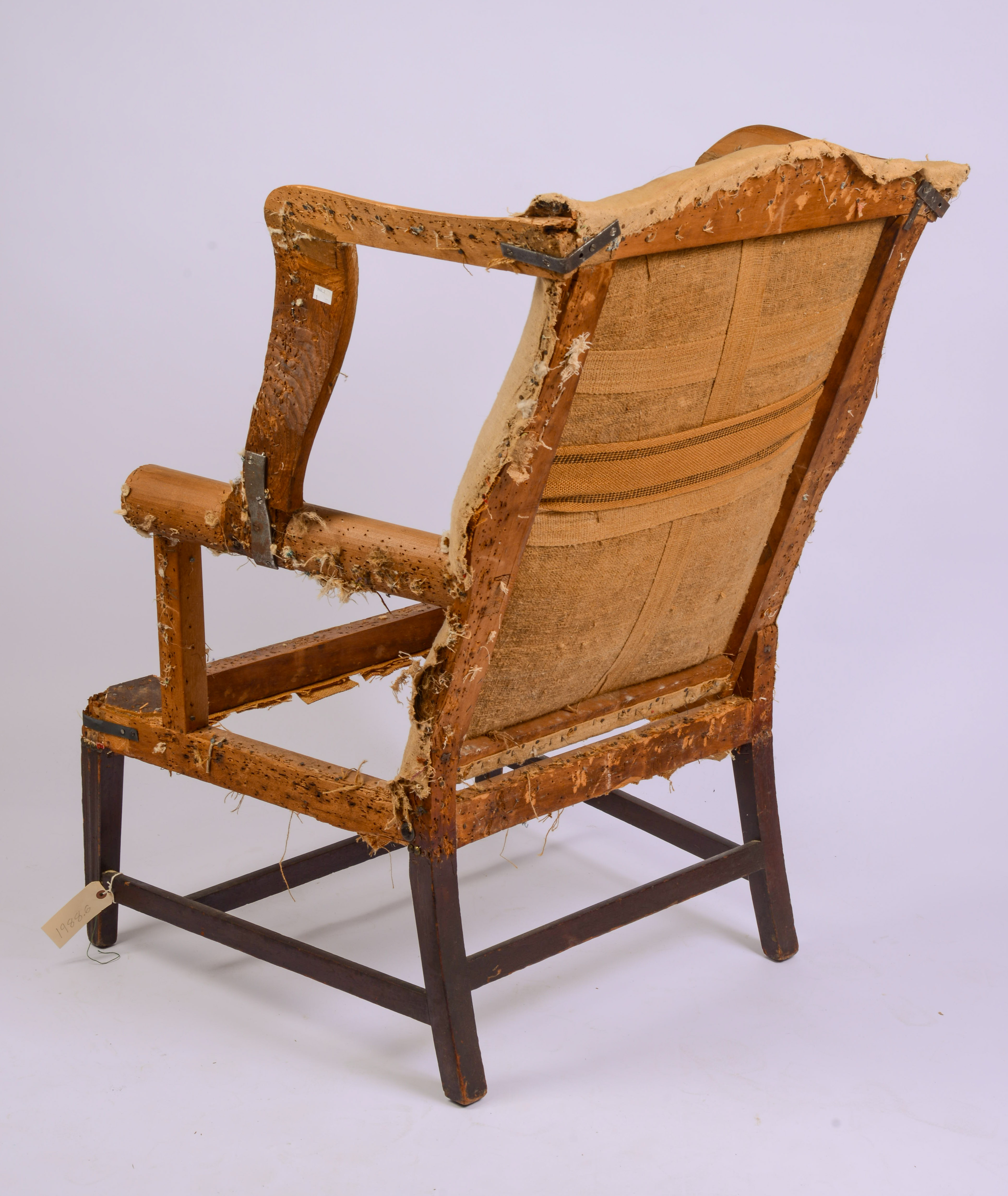 HEPPLEWHITE LOLLING CHAIR FRAME, CIRCA 1800.