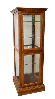 OAK DISPLAY CASE. Includes five glass shelves. Height 65.5 inches, width 20 inches, depth 20 