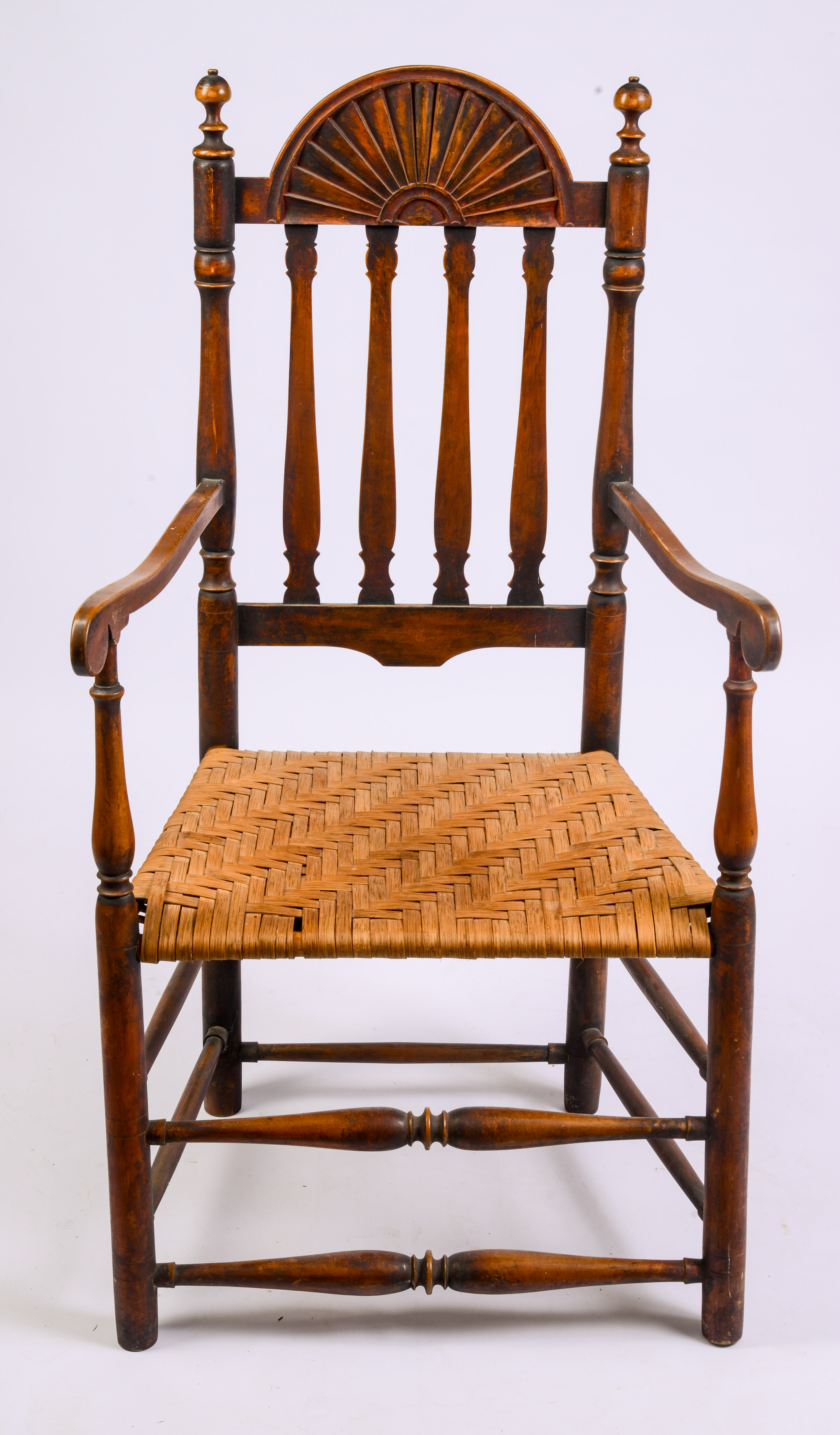 18TH CENTURY NEW ENGLAND ARMCHAIR WITH FAN CREST.