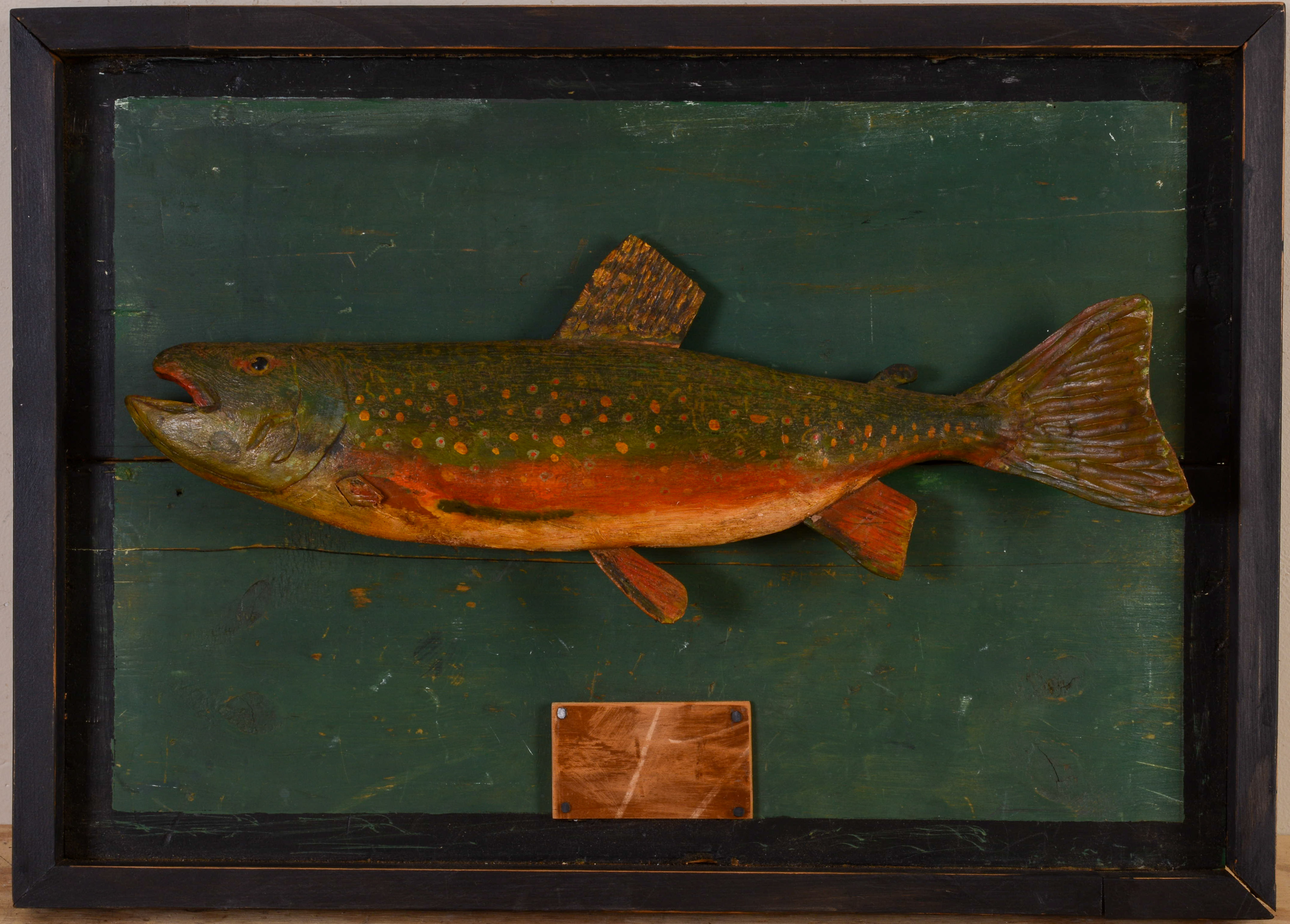 FOLK ART CARVED AND PAINTED FISH MOUNT.