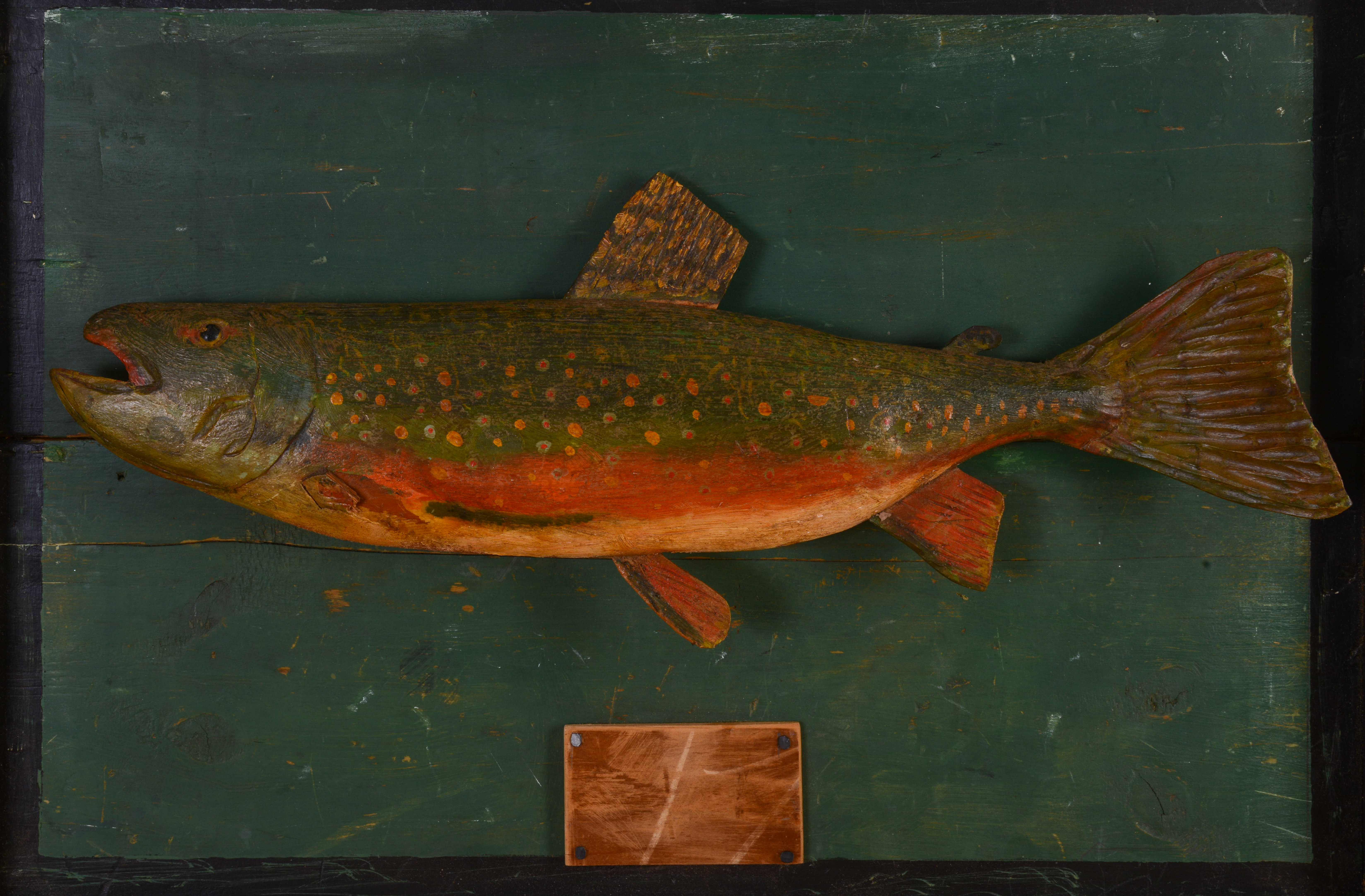 FOLK ART CARVED AND PAINTED FISH MOUNT.