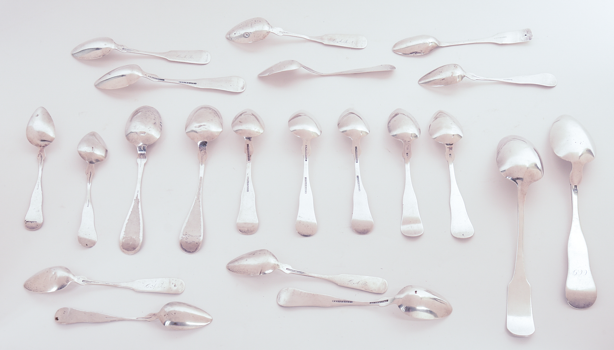TWENTY COIN SILVER SPOONS.