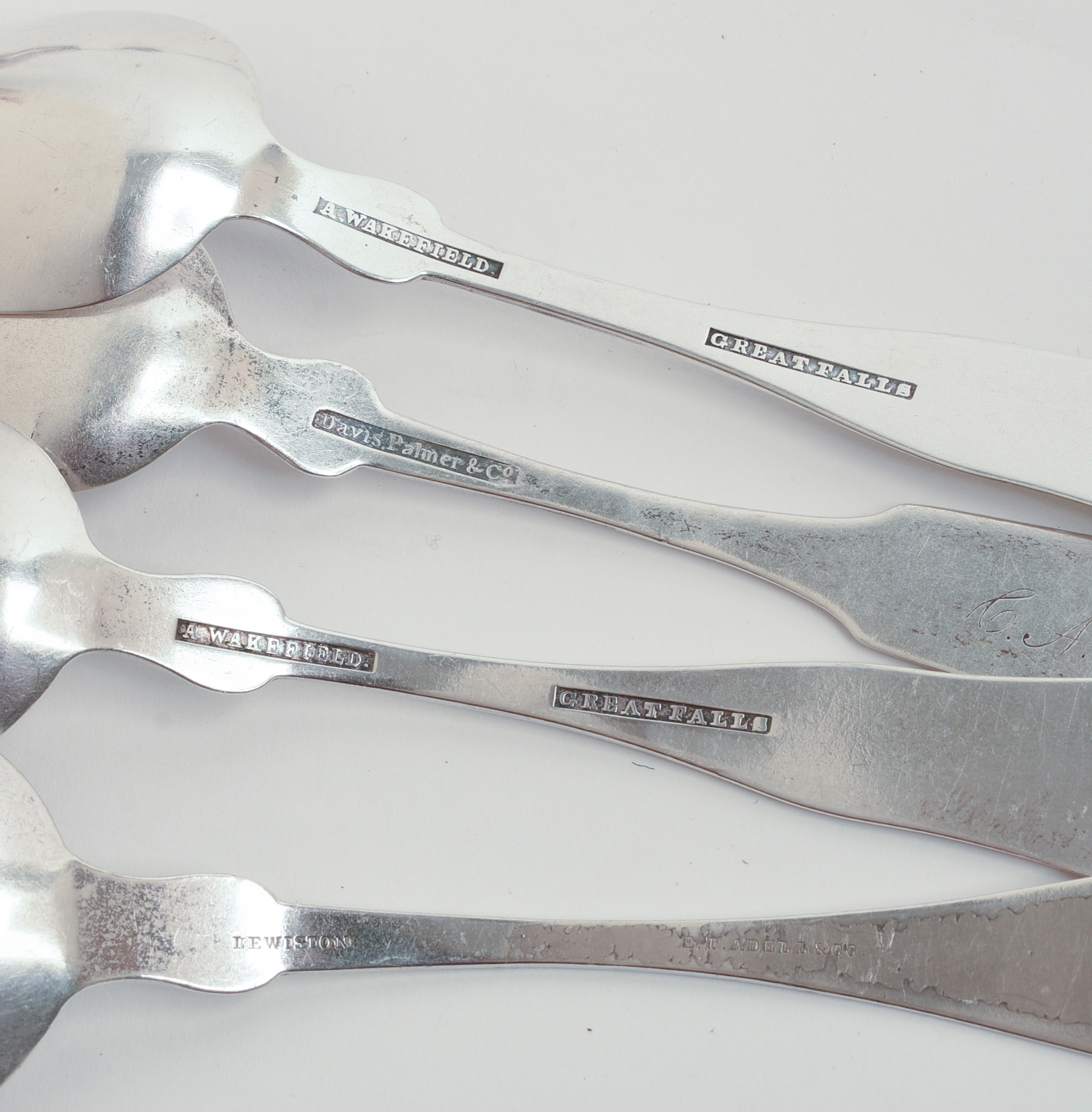 TWENTY COIN SILVER SPOONS.