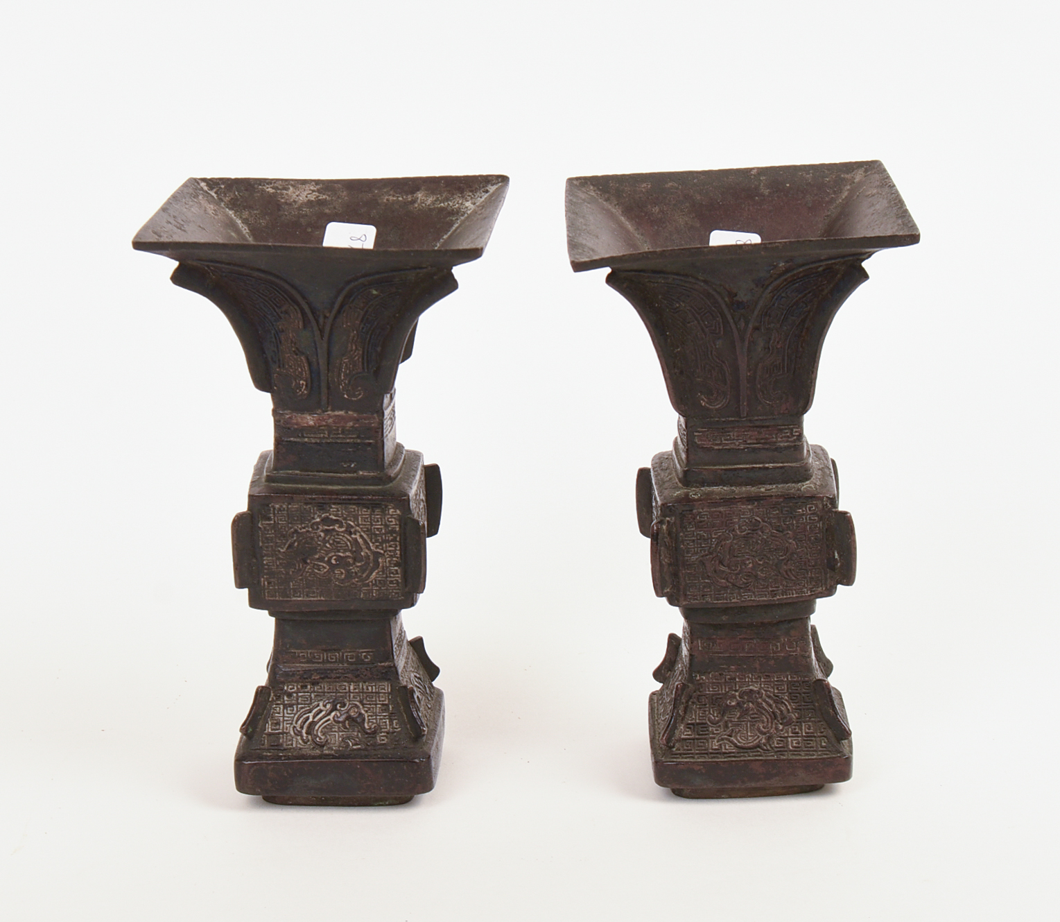 PAIR OF CHINESE MINIATURE ARCHAISTIC "GU" SHAPED BRONZE VASES.