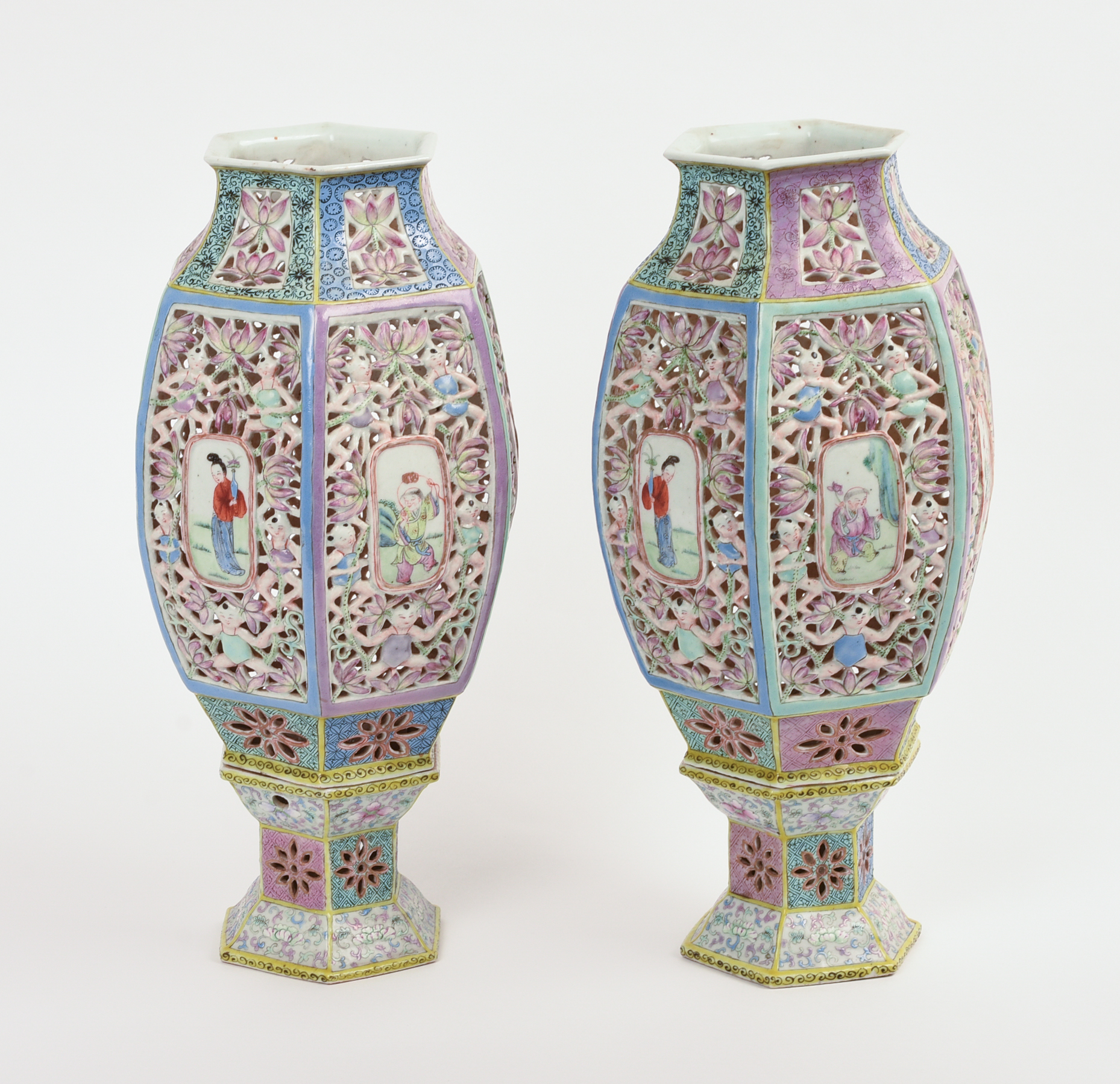 PAIR OF CHINESE RETICULATED FAMILLE ROSE "WEDDING LANTERNS."