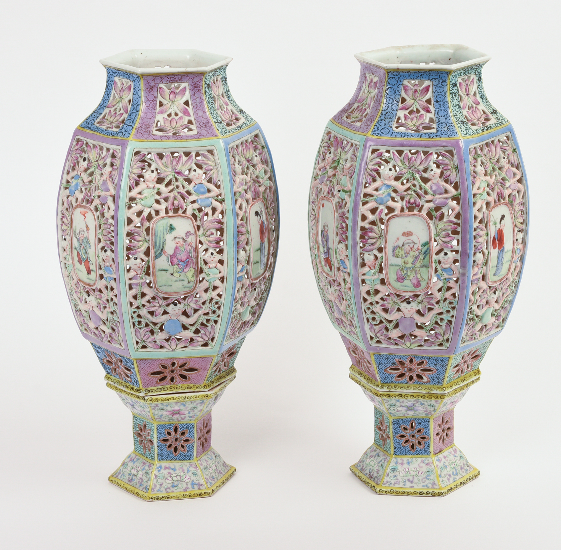 PAIR OF CHINESE RETICULATED FAMILLE ROSE "WEDDING LANTERNS."