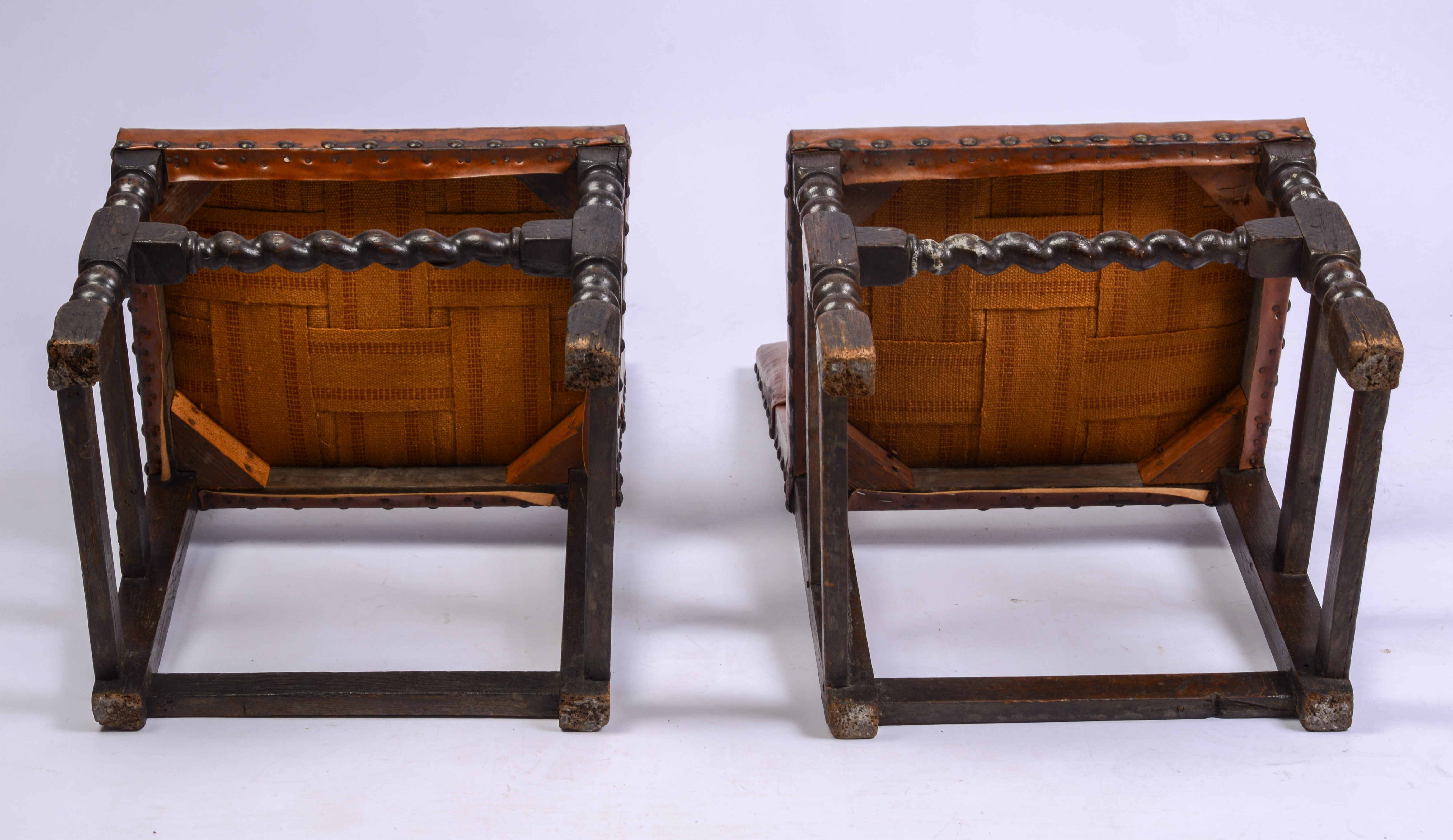 SCARCE SET OF FOUR, MID-17TH CENTURY LEATHER BACK STOOLS.