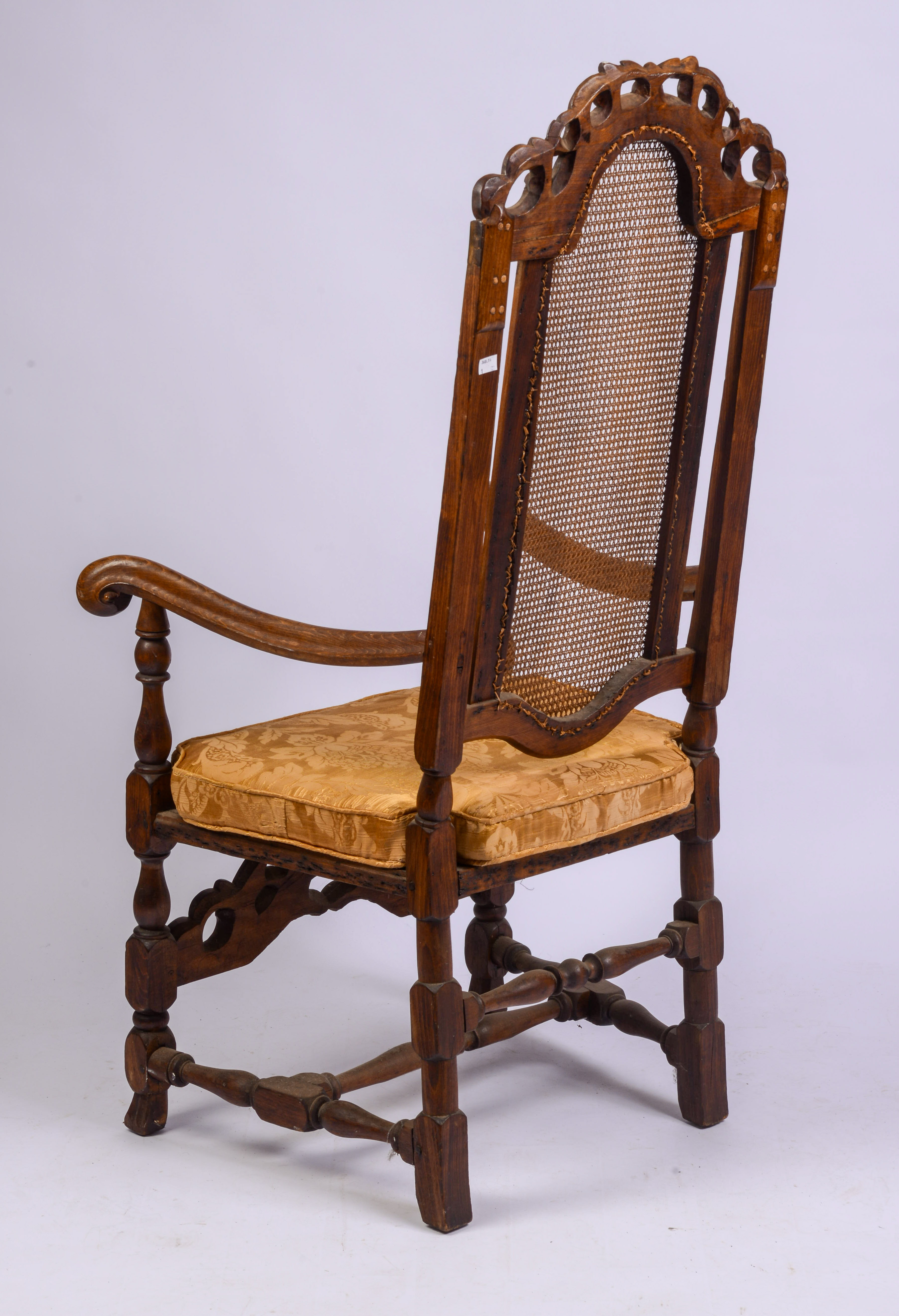 JACOBEAN CANE BACK ARMCHAIR.