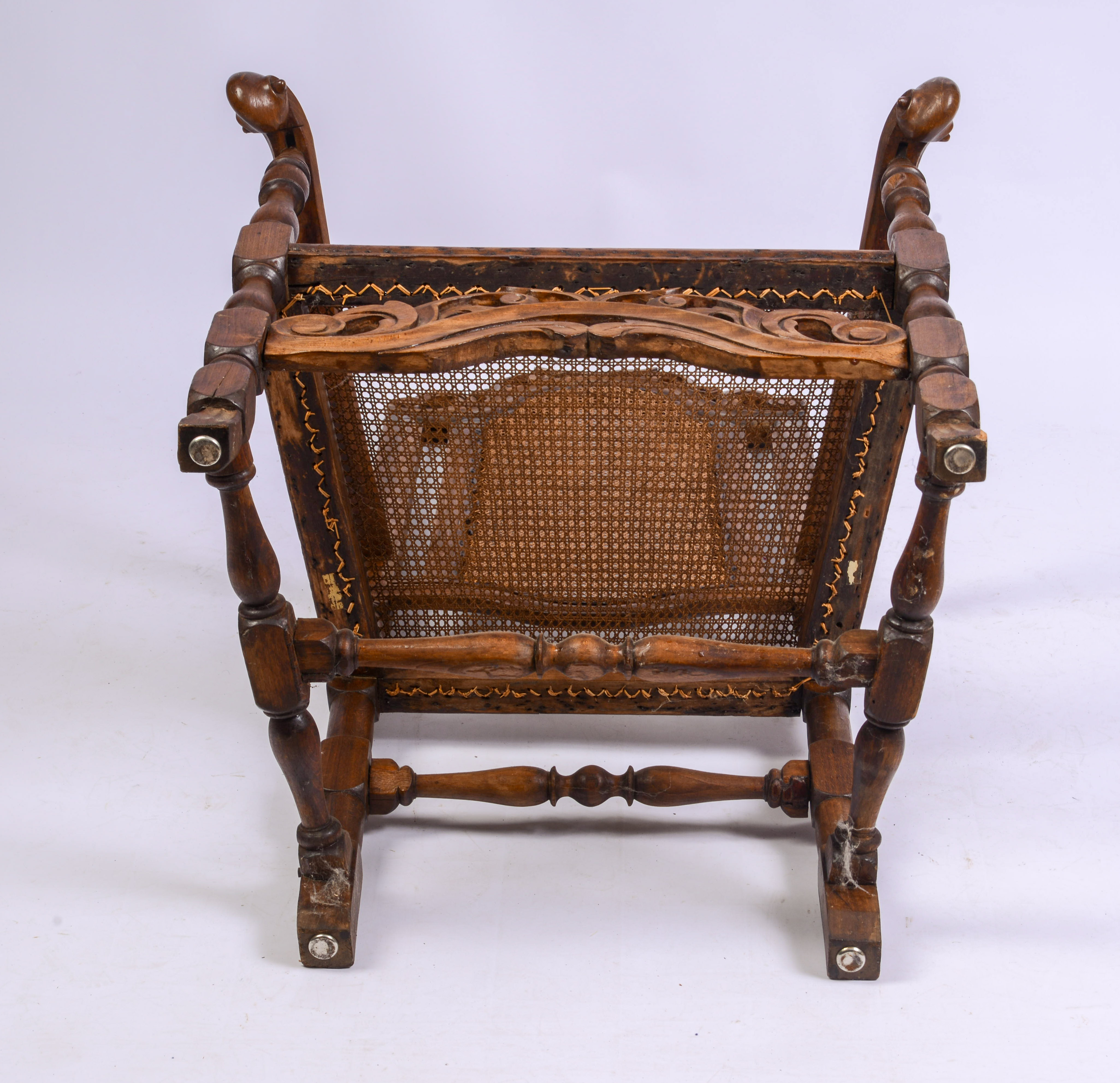 JACOBEAN CANE BACK ARMCHAIR.