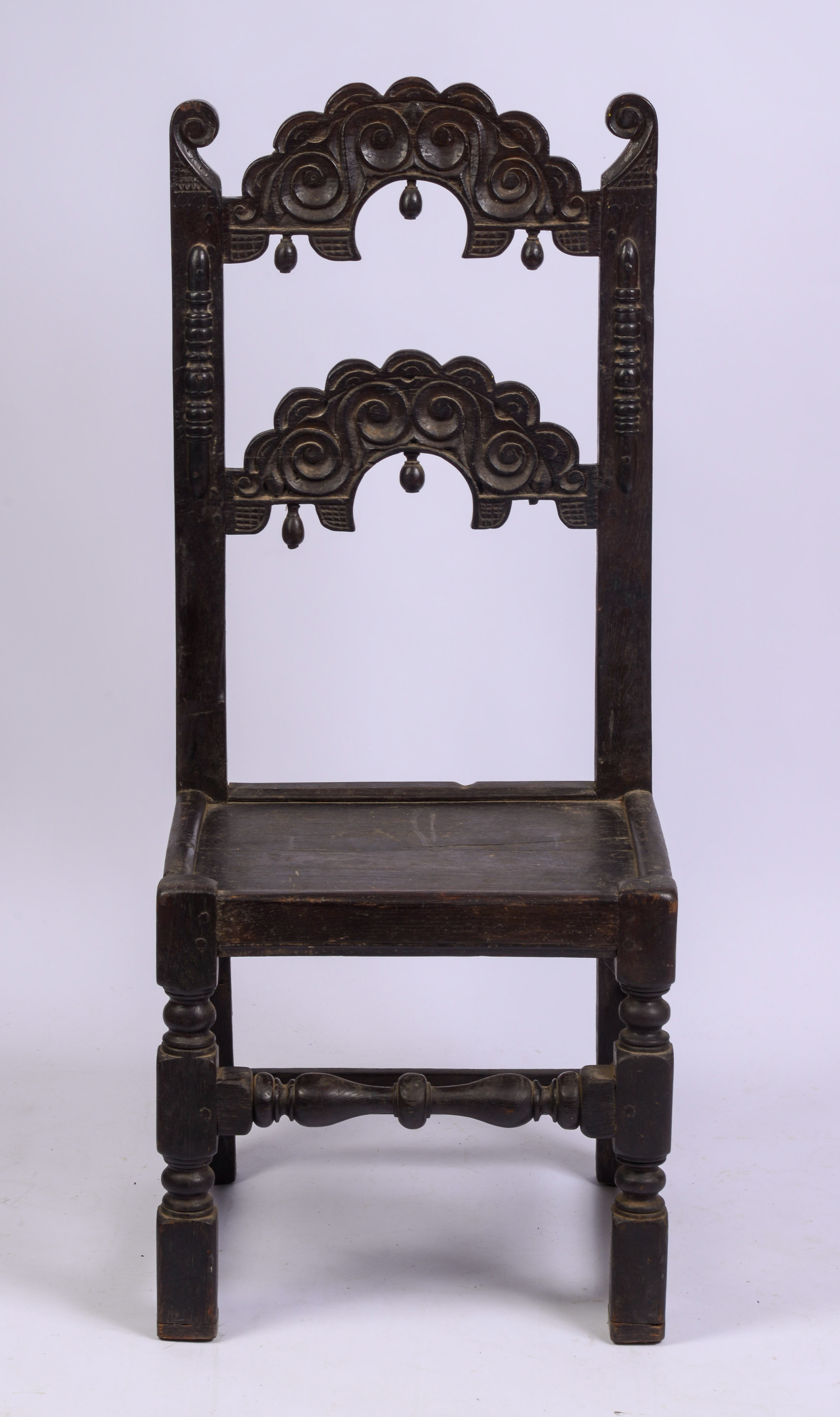 YORKSHIRE CARVED OAK BACK STOOL. CIRCA 1670 - 1690.