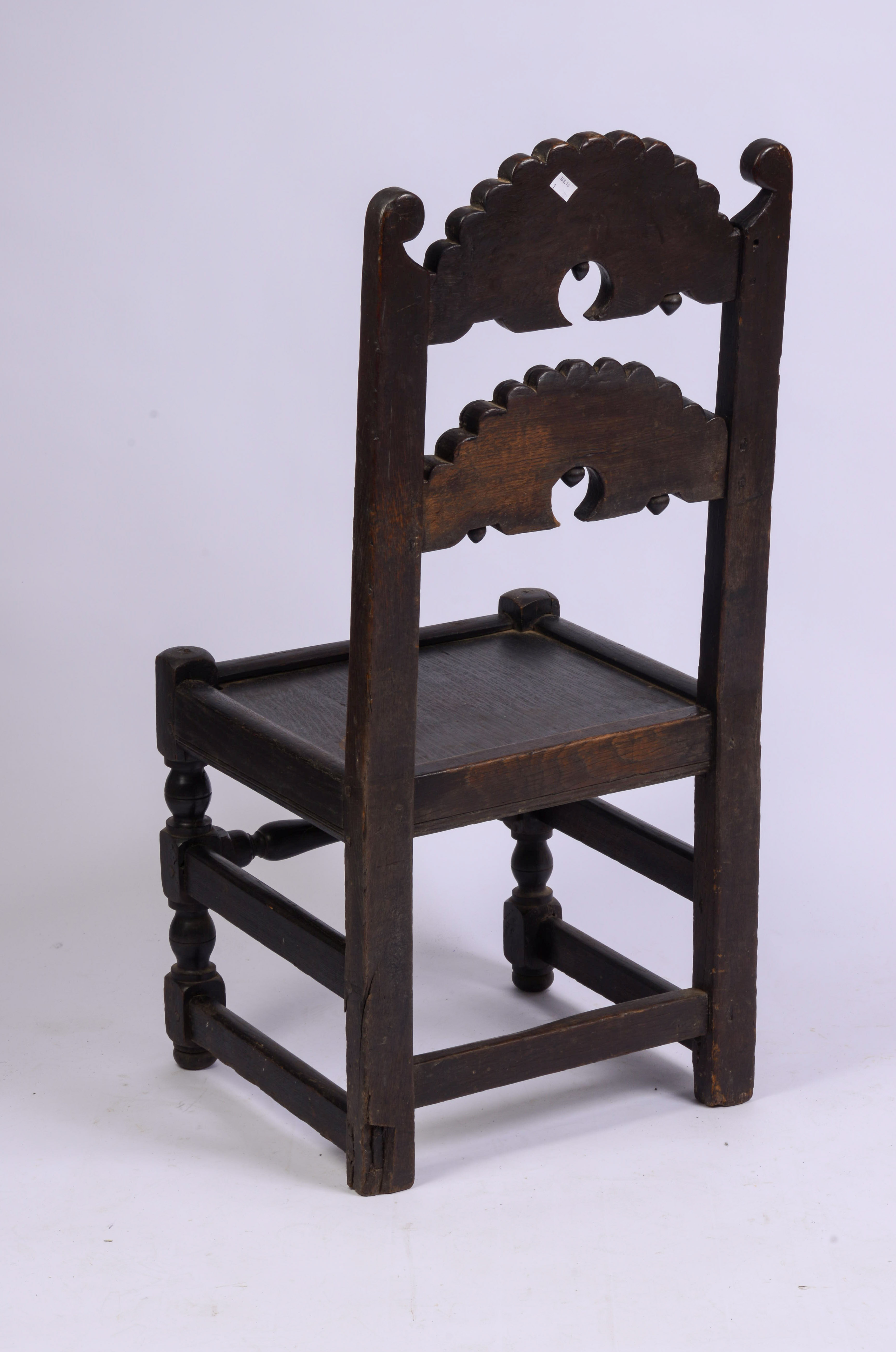YORKSHIRE CARVED BACK STOOL. CIRCA 1670 - 1690.