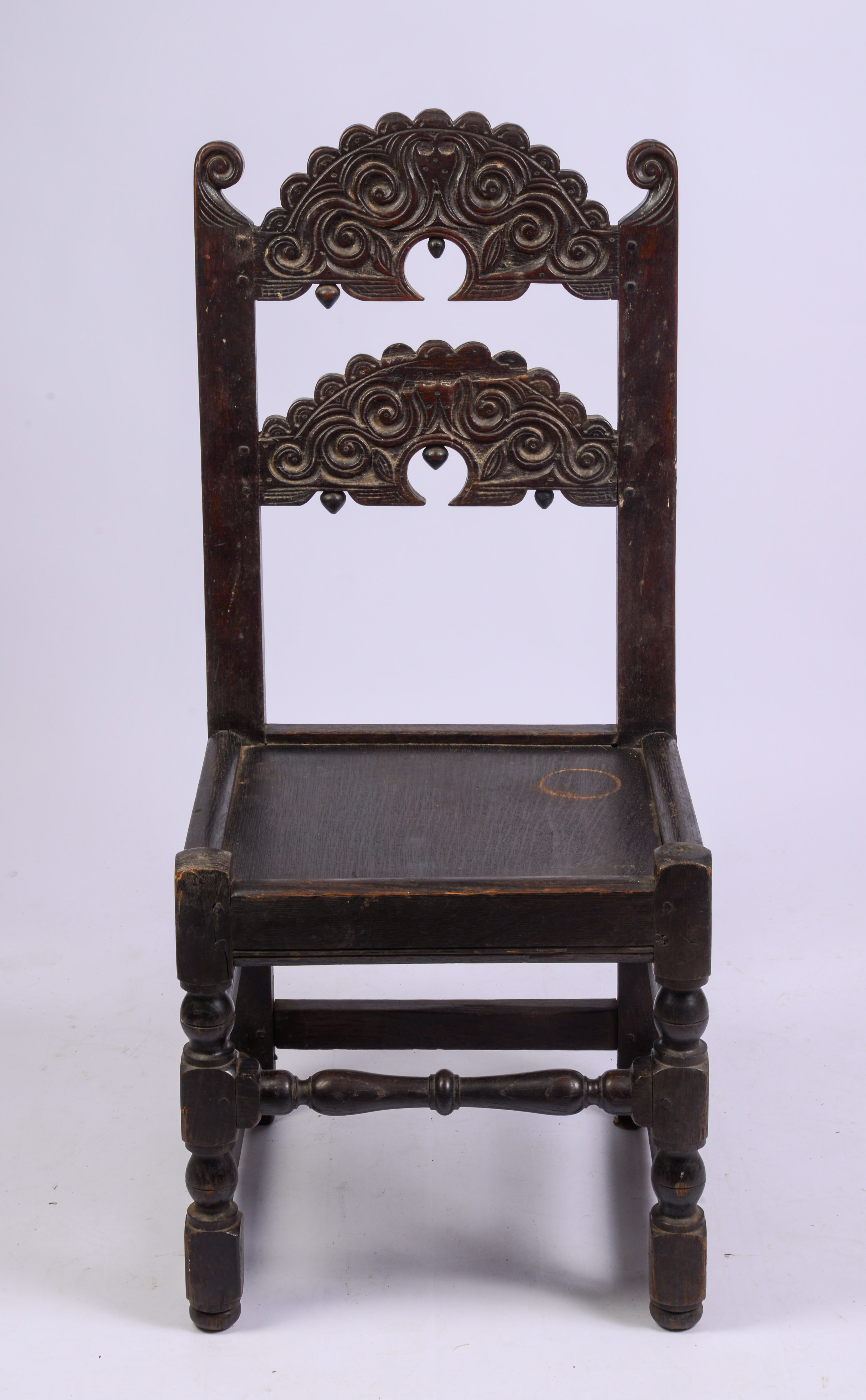 YORKSHIRE CARVED BACK STOOL. CIRCA 1670 - 1690.