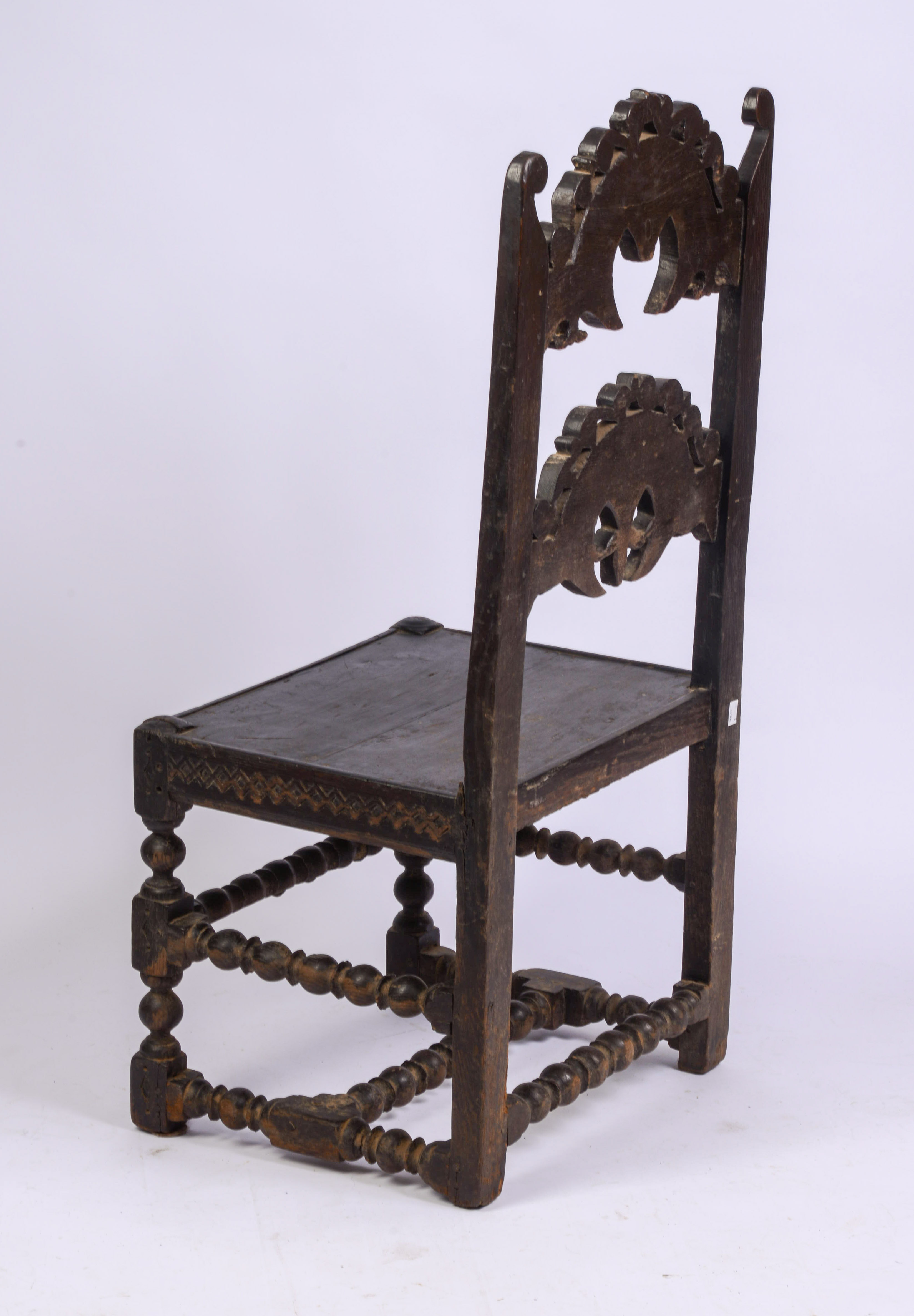 YORKSHIRE CARVED BACK STOOL, CIRCA 1670 - 1690.