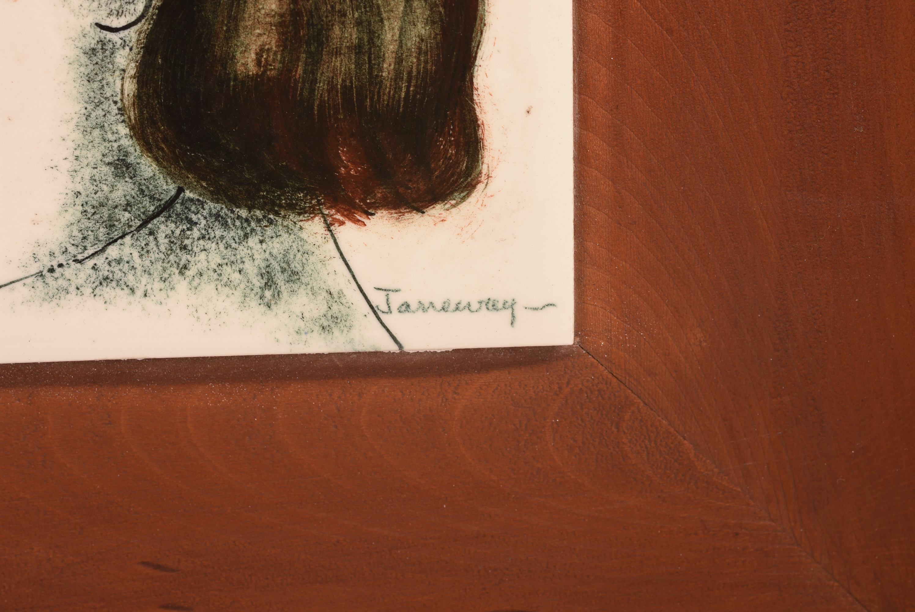 A FRAMED TILE PROFILE PORTRAIT SIGNED JANEWAY.