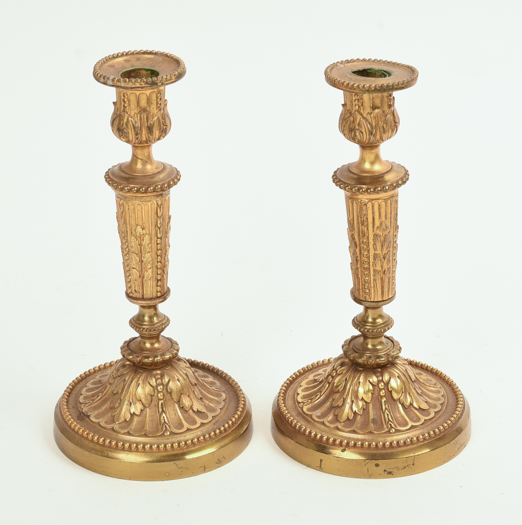 A PAIR OF FRENCH EMPIRE-STYLE GILT BRASS CANDLESTICKS