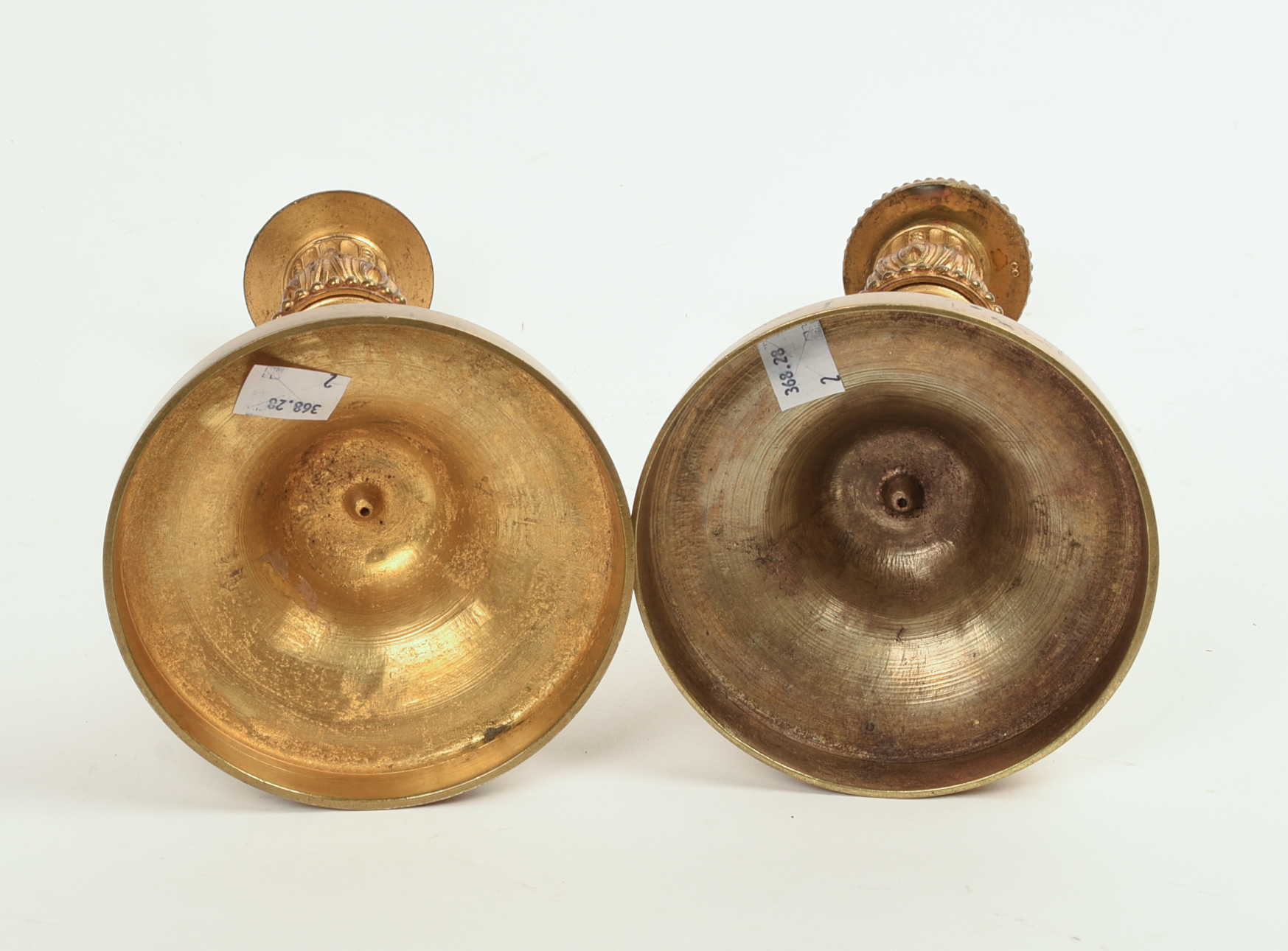 A PAIR OF FRENCH EMPIRE-STYLE GILT BRASS CANDLESTICKS